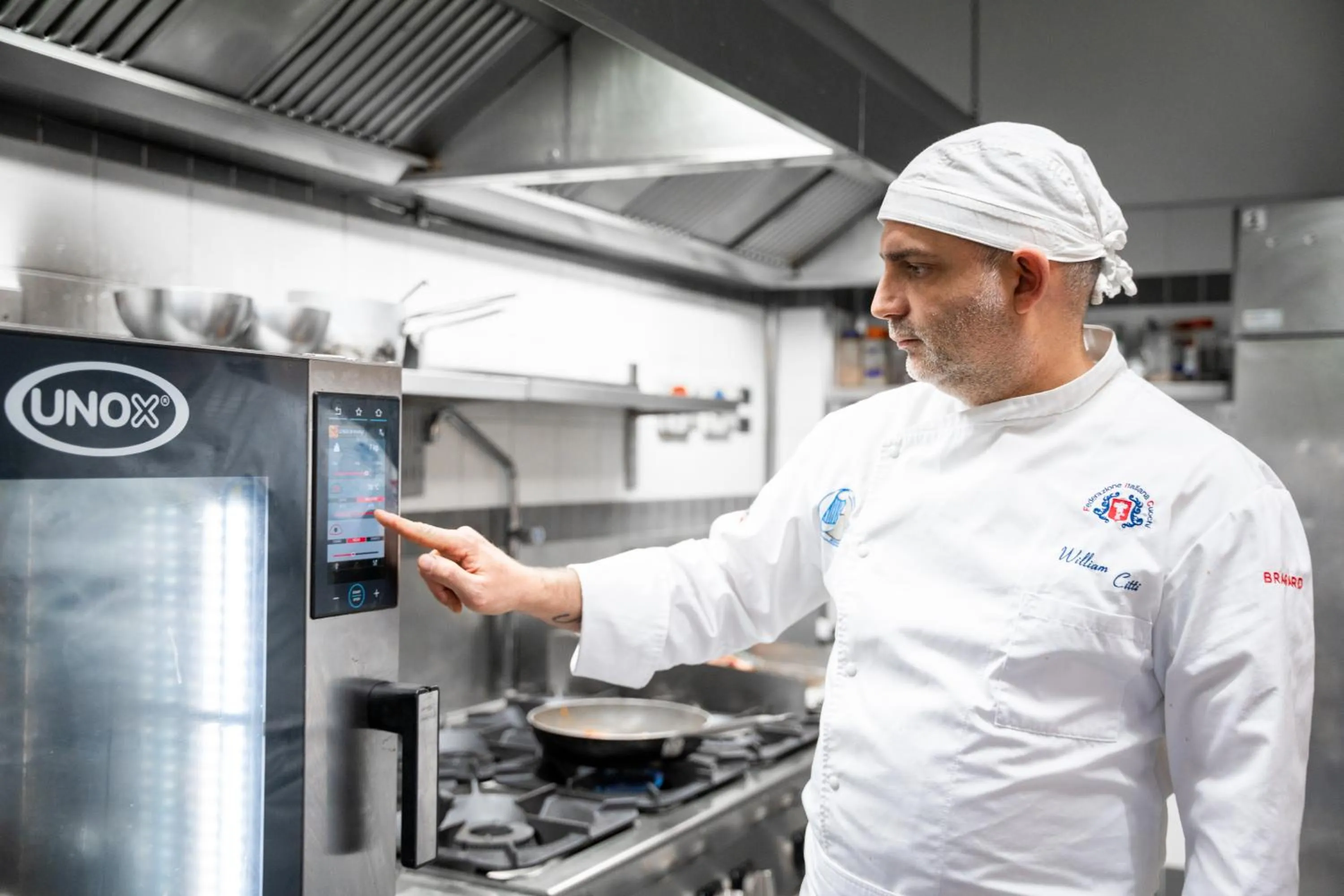 kitchen in EcoHotel Ristorante Milano