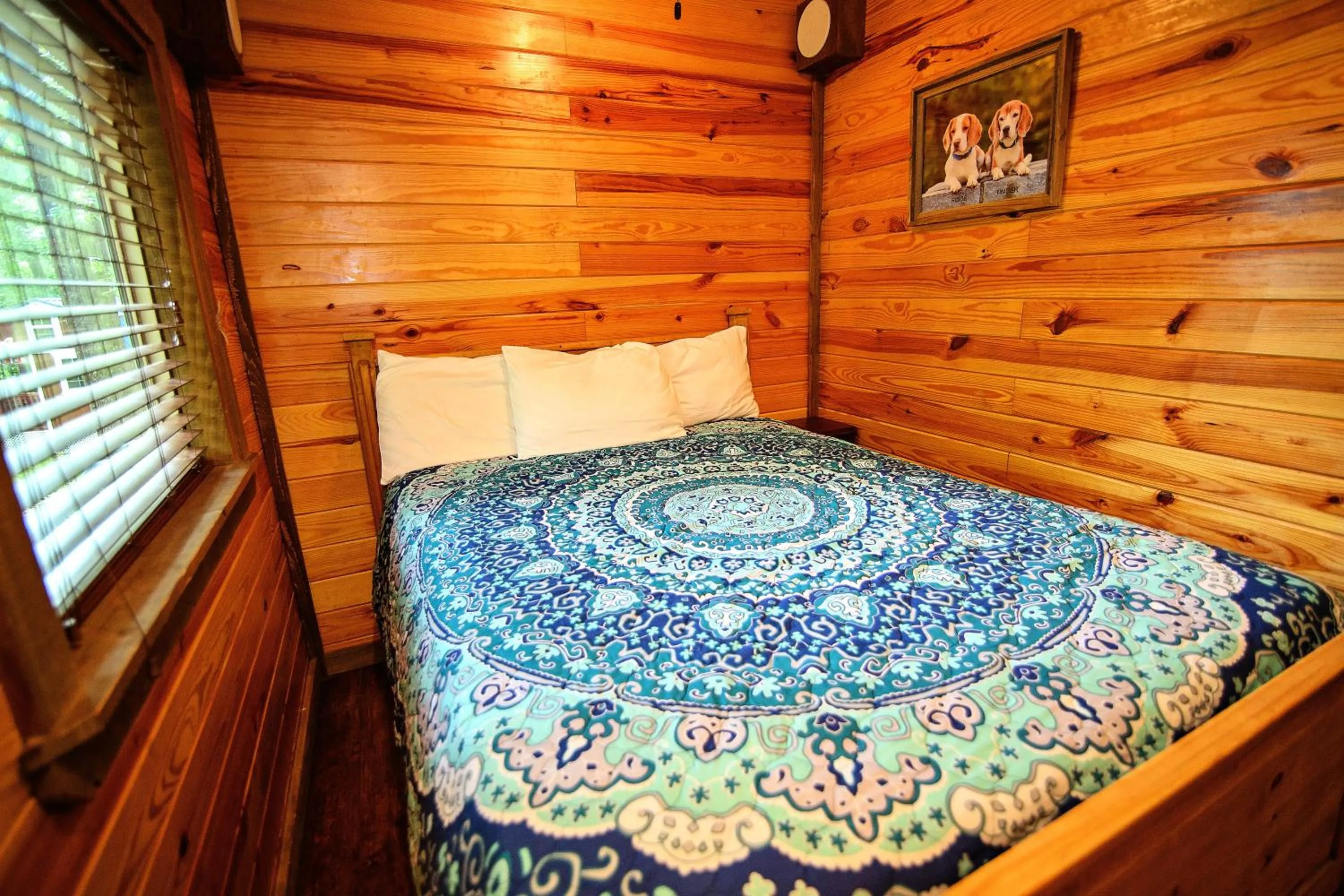 Bed in The Codex - Parker Creek Bend Cabins