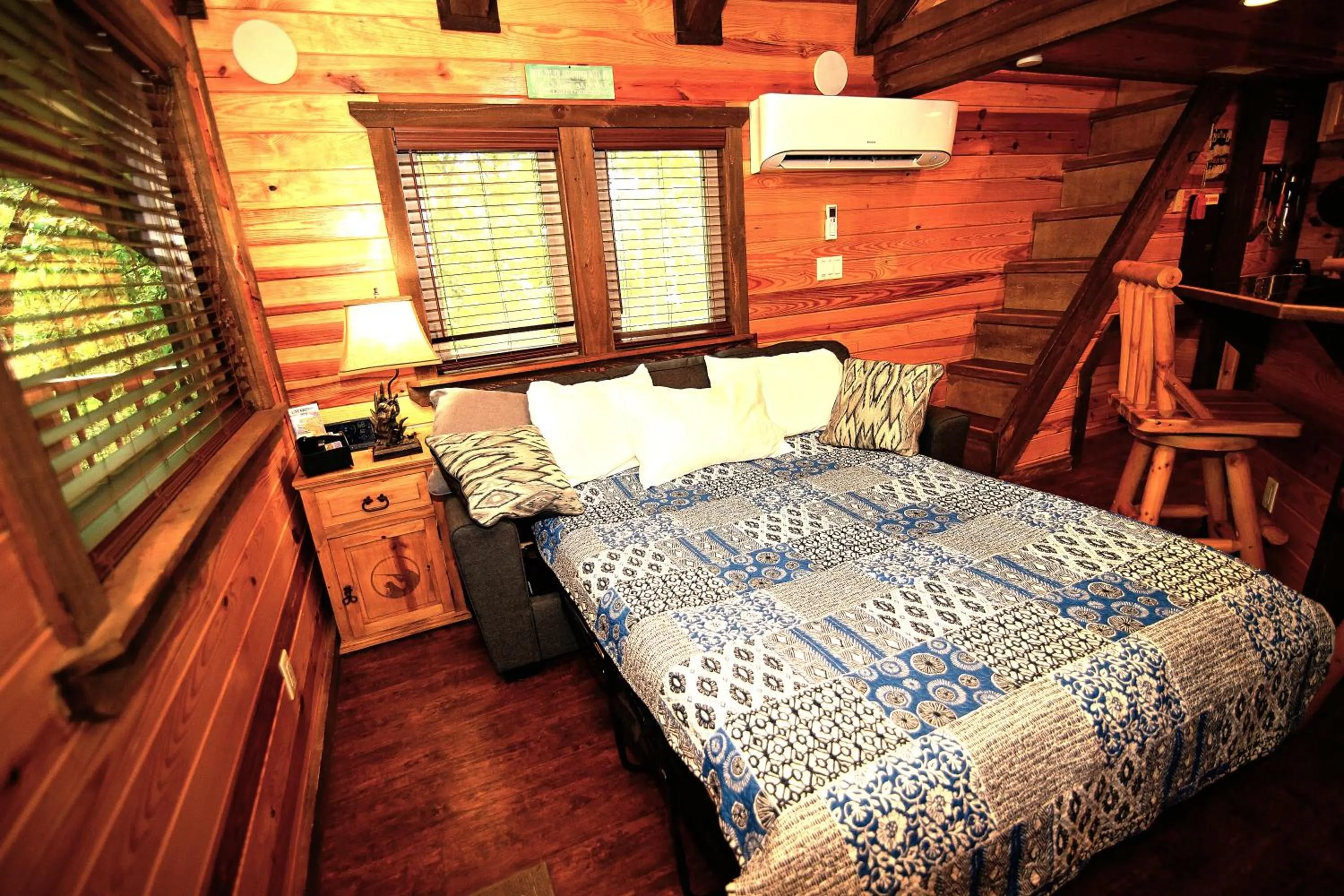 Bed in The Codex - Parker Creek Bend Cabins