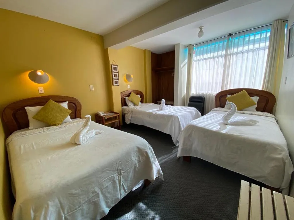 Photo of the whole room, Bed in Hostal Oscar Inn