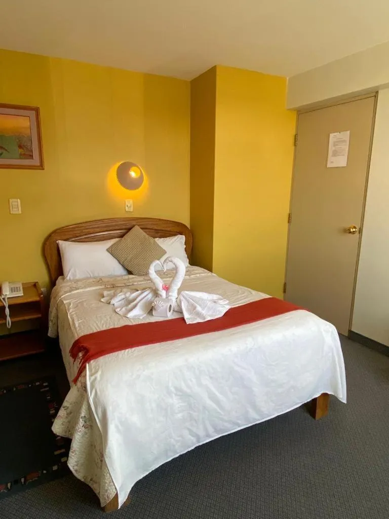 Photo of the whole room, Bed in Hostal Oscar Inn