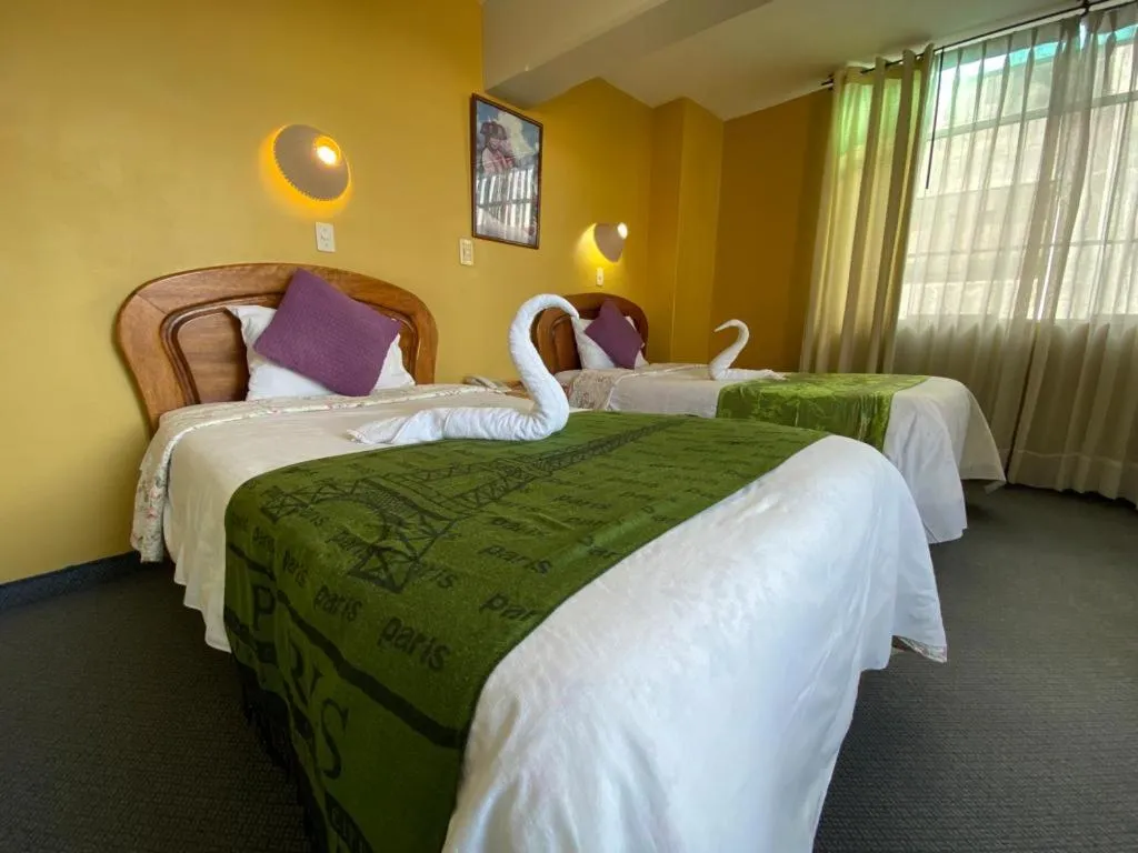 Photo of the whole room, Bed in Hostal Oscar Inn