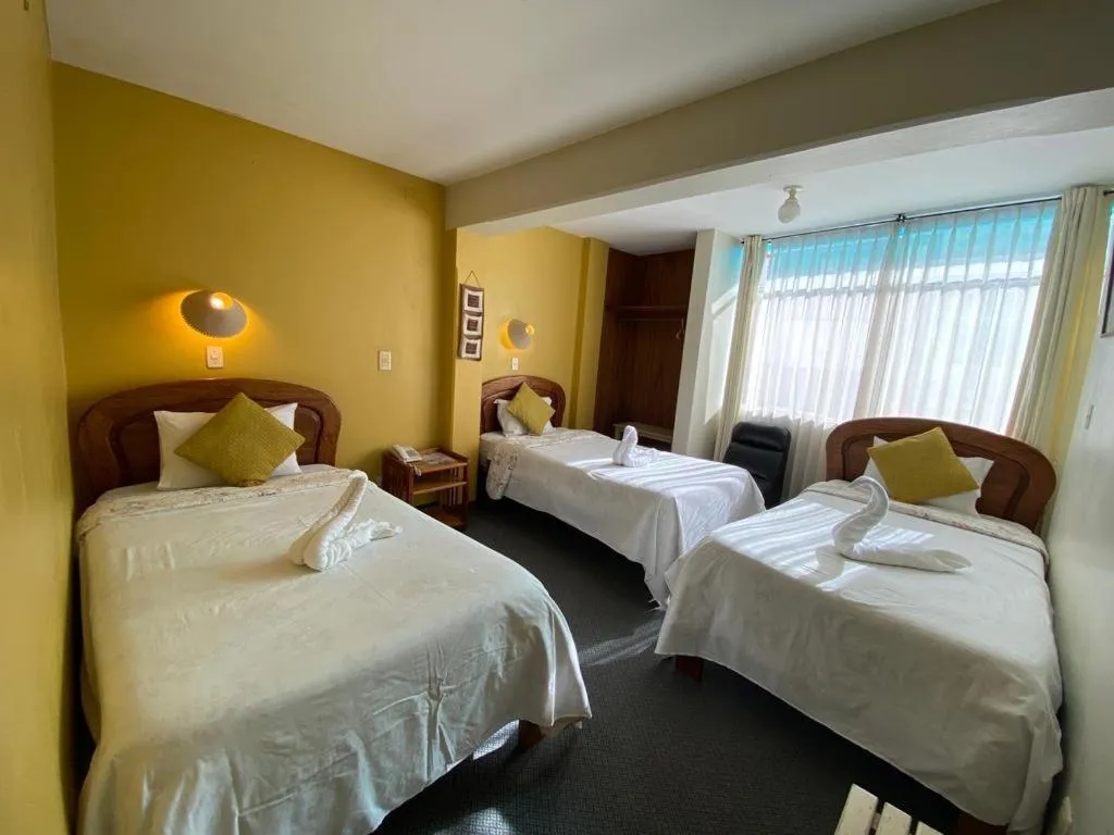 Photo of the whole room, Bed in Hostal Oscar Inn