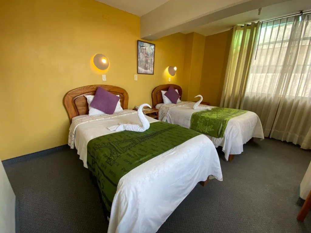 Photo of the whole room, Bed in Hostal Oscar Inn