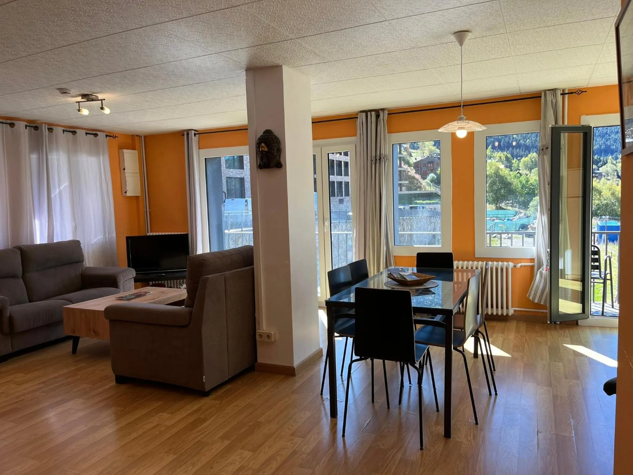 Communal lounge/ TV room in Hotel Roc de St Miquel & Apartment