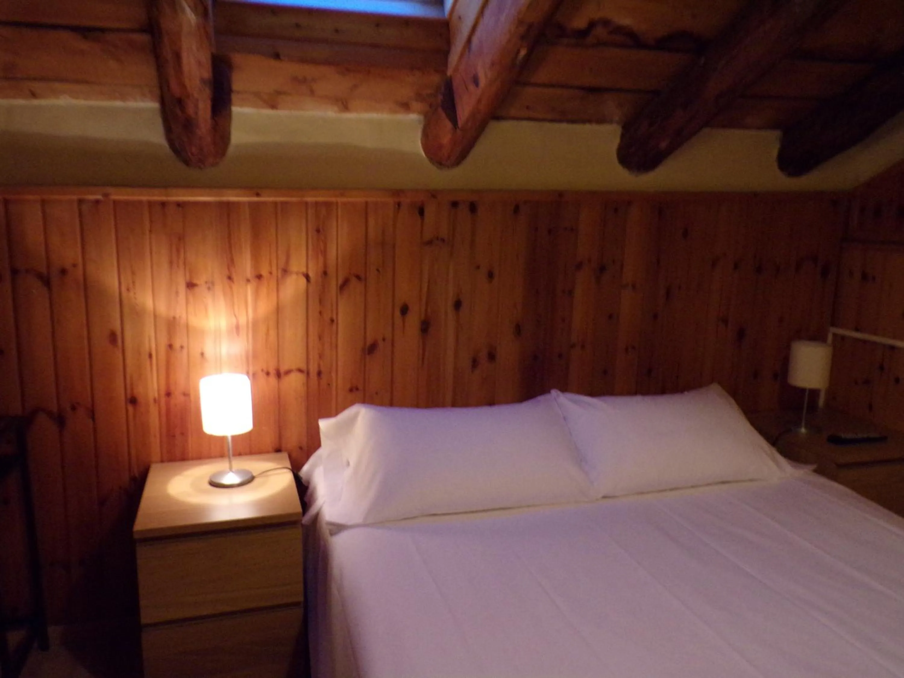 Bed in Hotel Roc de St Miquel & Apartment