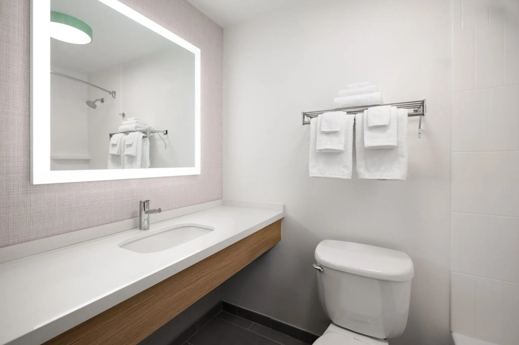 Bathroom in Garner Hotel Augusta West by IHG