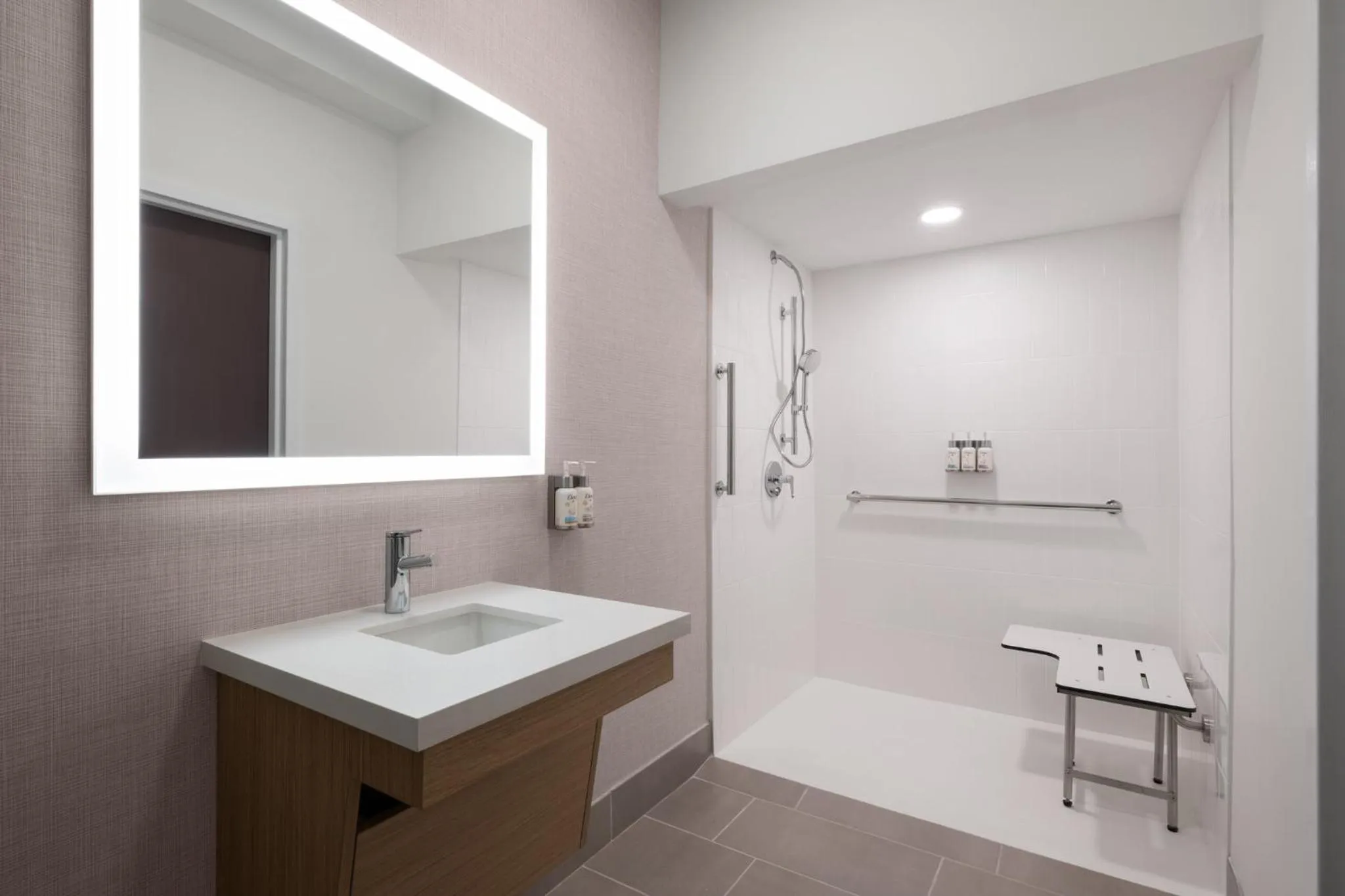 Bathroom in Garner Hotel Augusta West by IHG