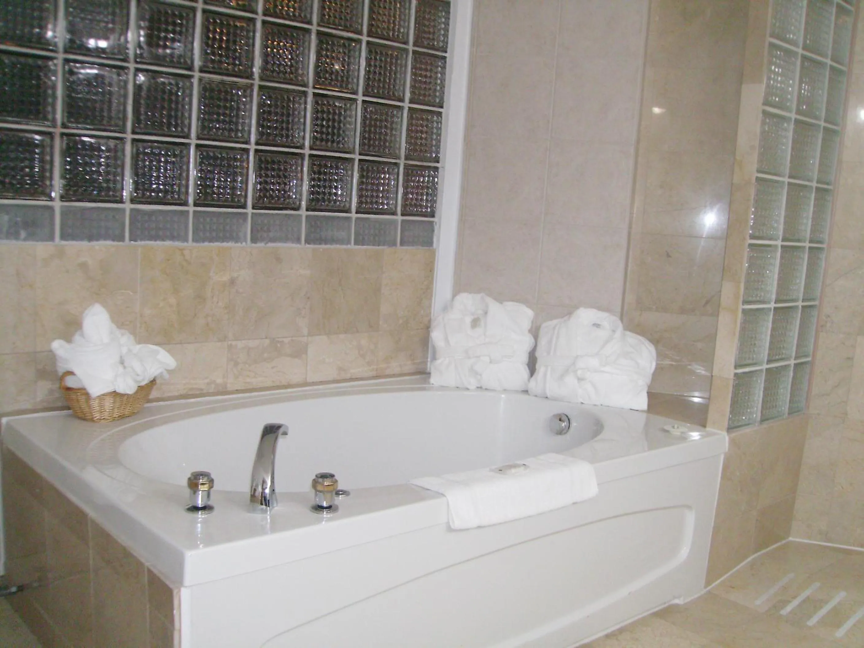 Bathroom in Days Inn & Suites by Wyndham North Bay Downtown