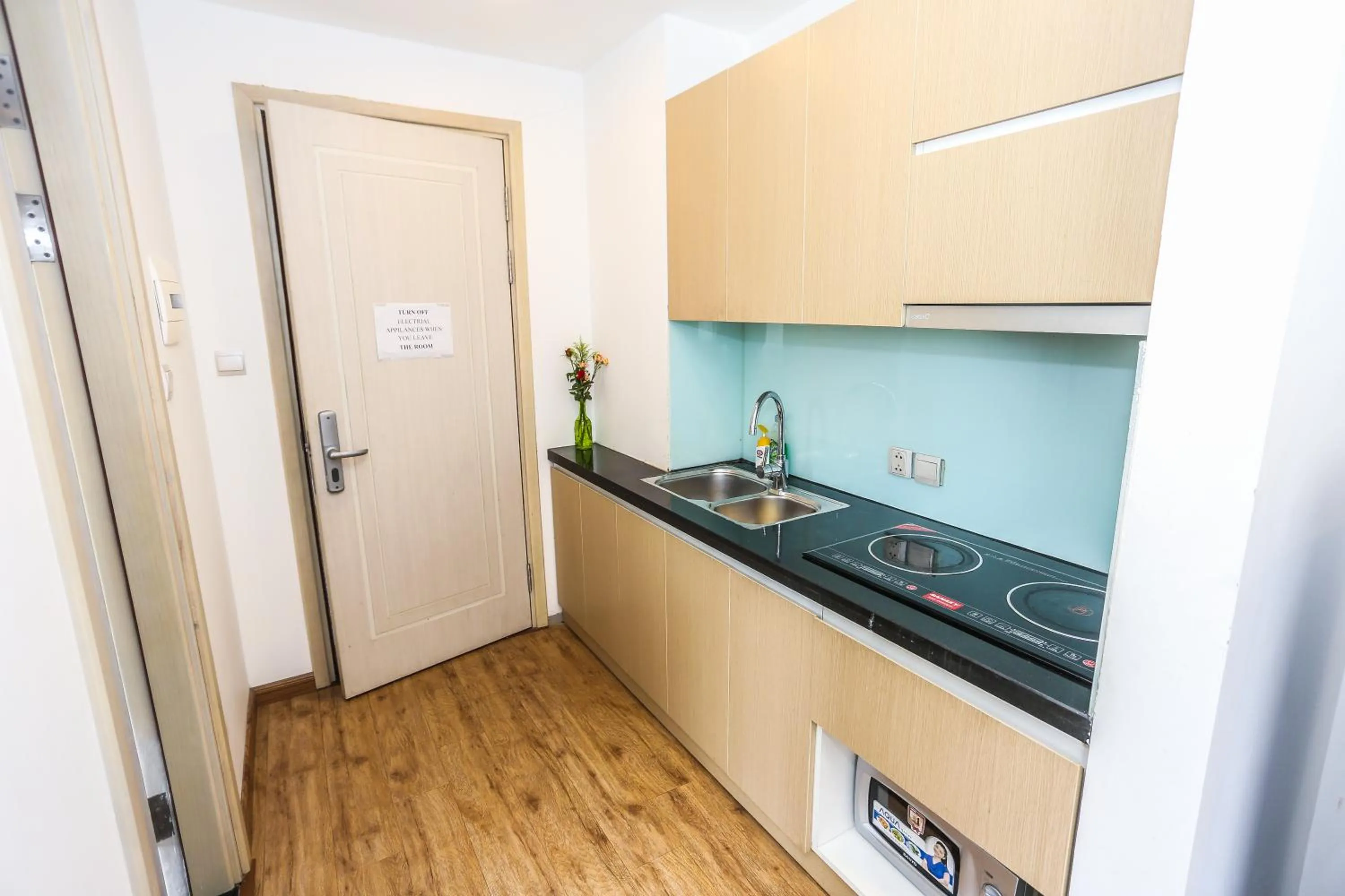 Kitchen or kitchenette in Ficus Suites