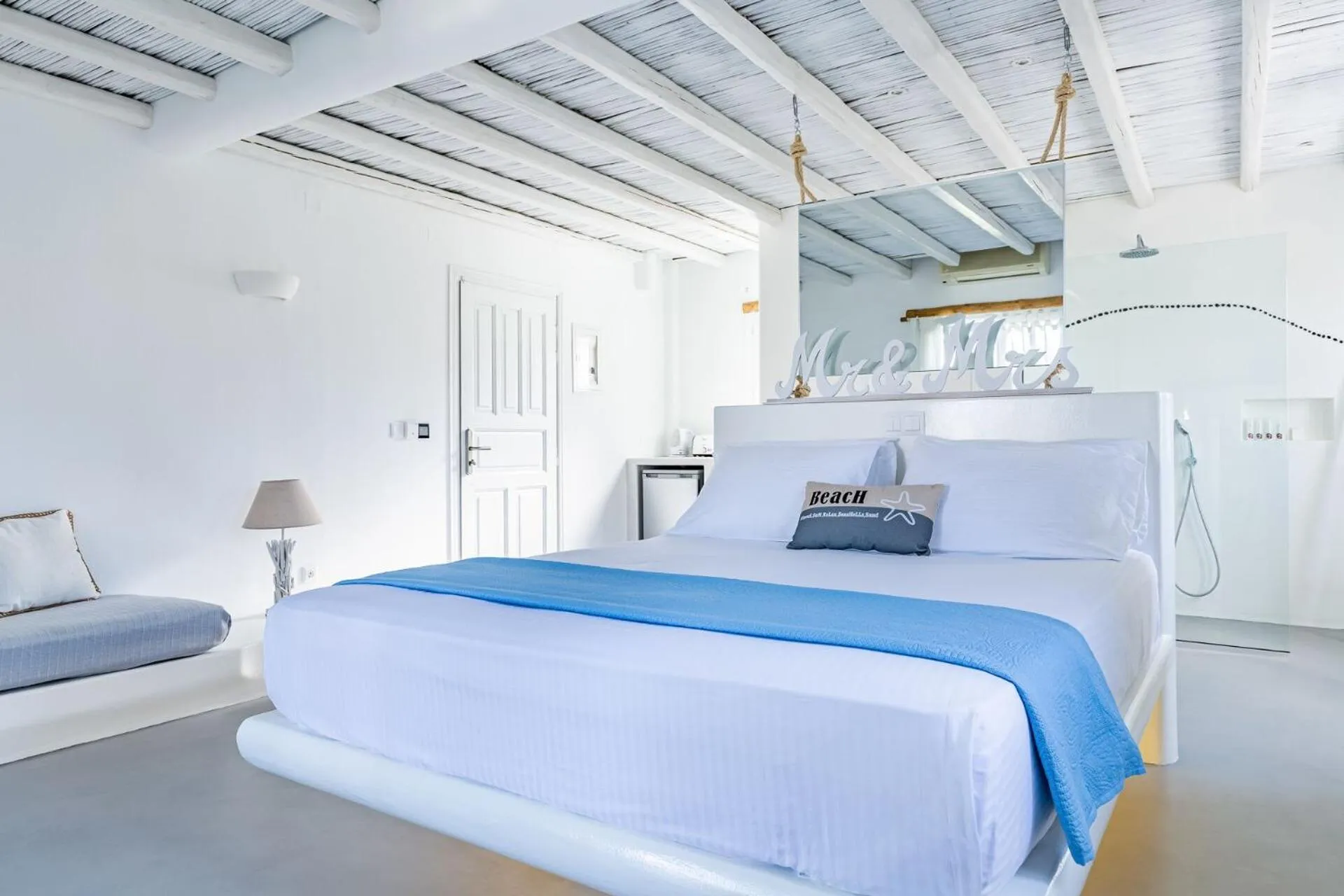 Bed in Evlalia Studios & Villas