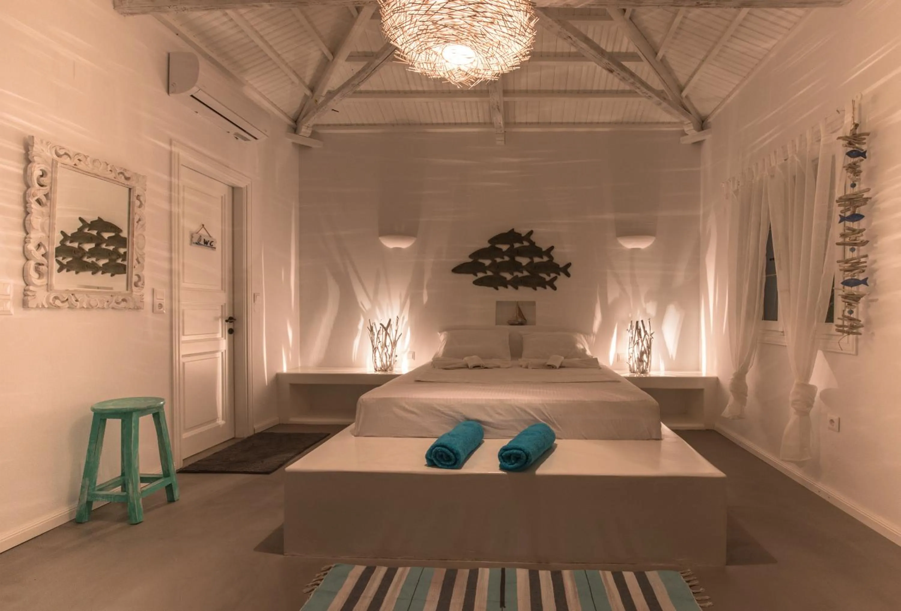 Bed in Evlalia Studios & Villas