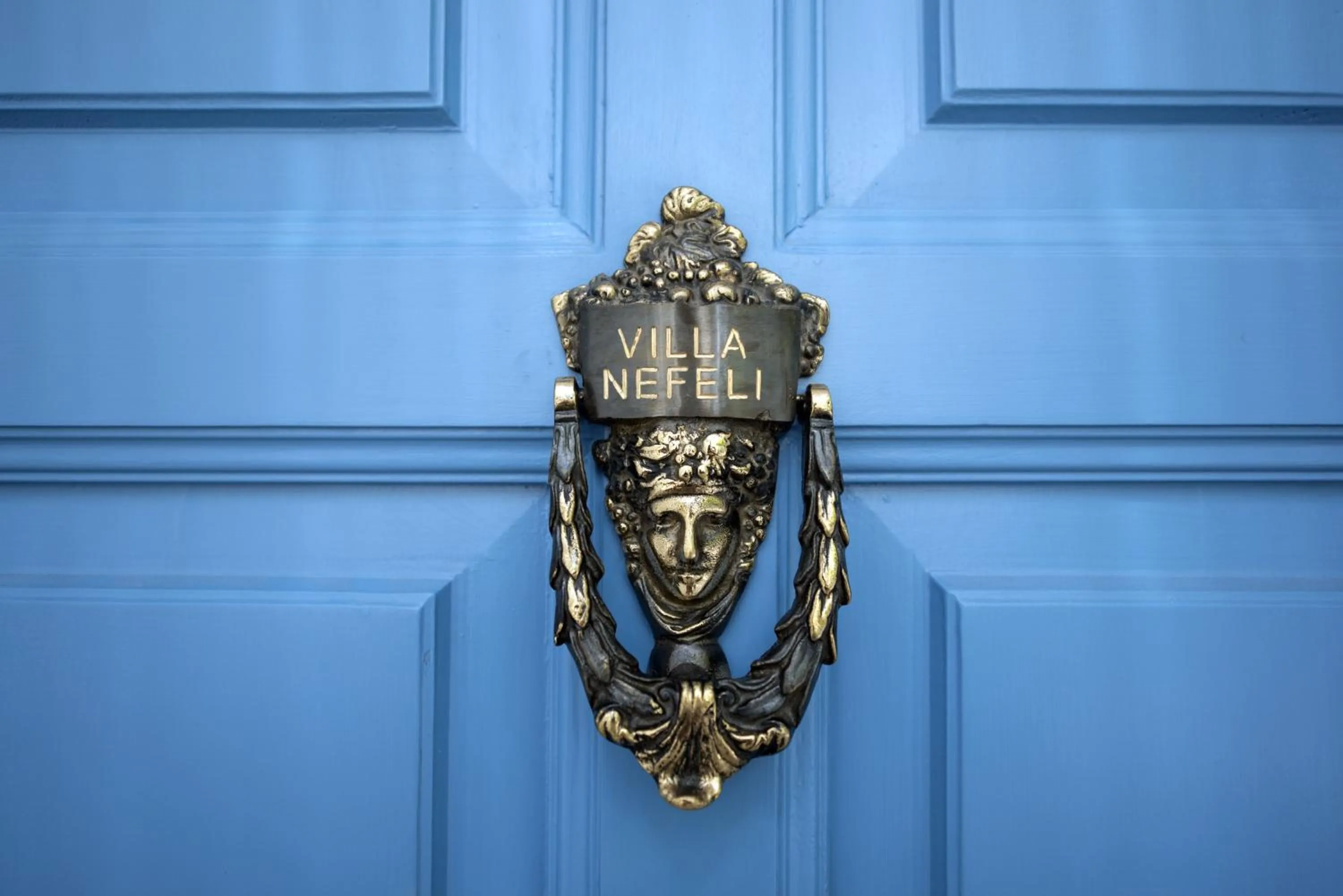 Text overlay in Evlalia Studios & Villas