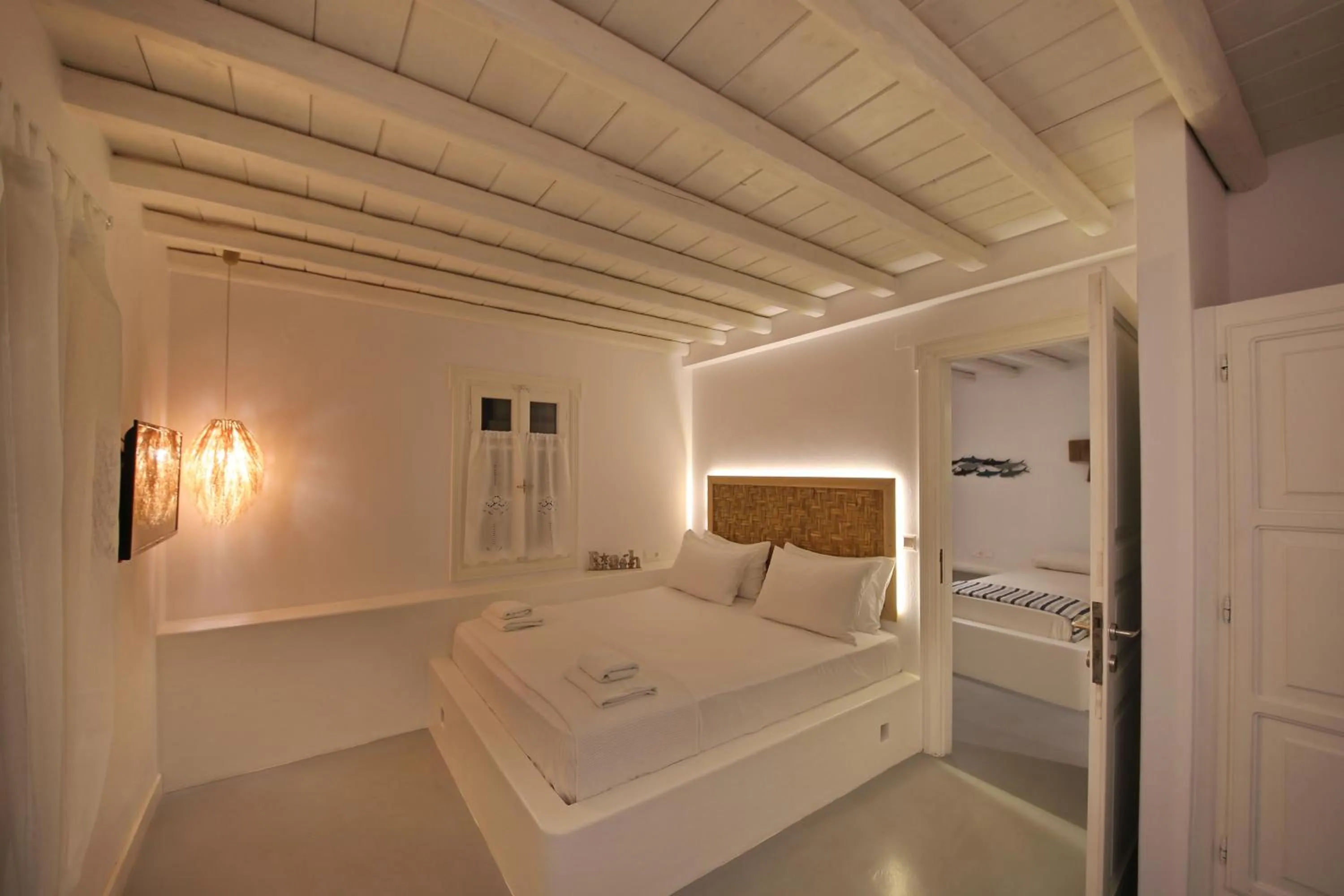Bed in Evlalia Studios & Villas