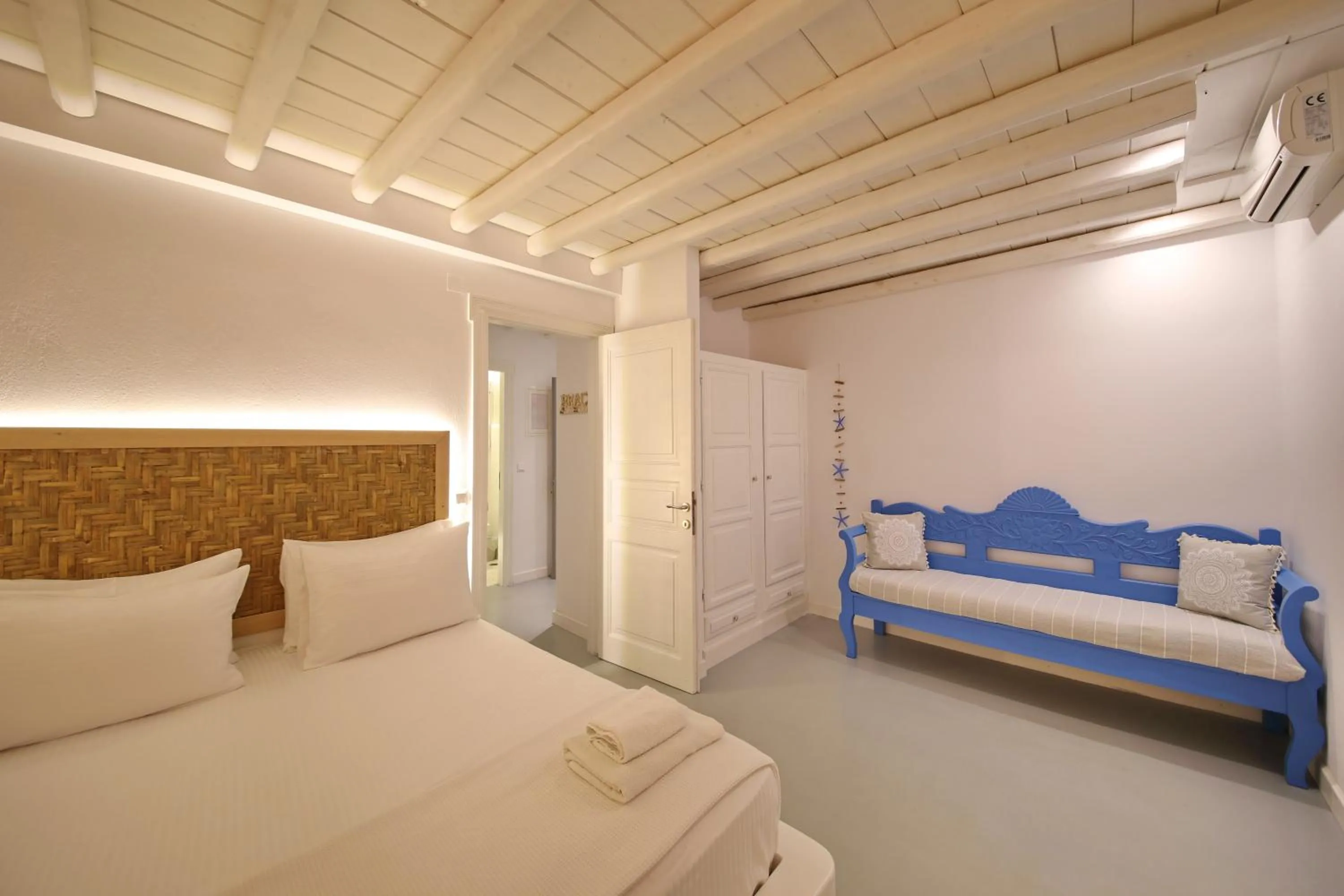 Bed in Evlalia Studios & Villas