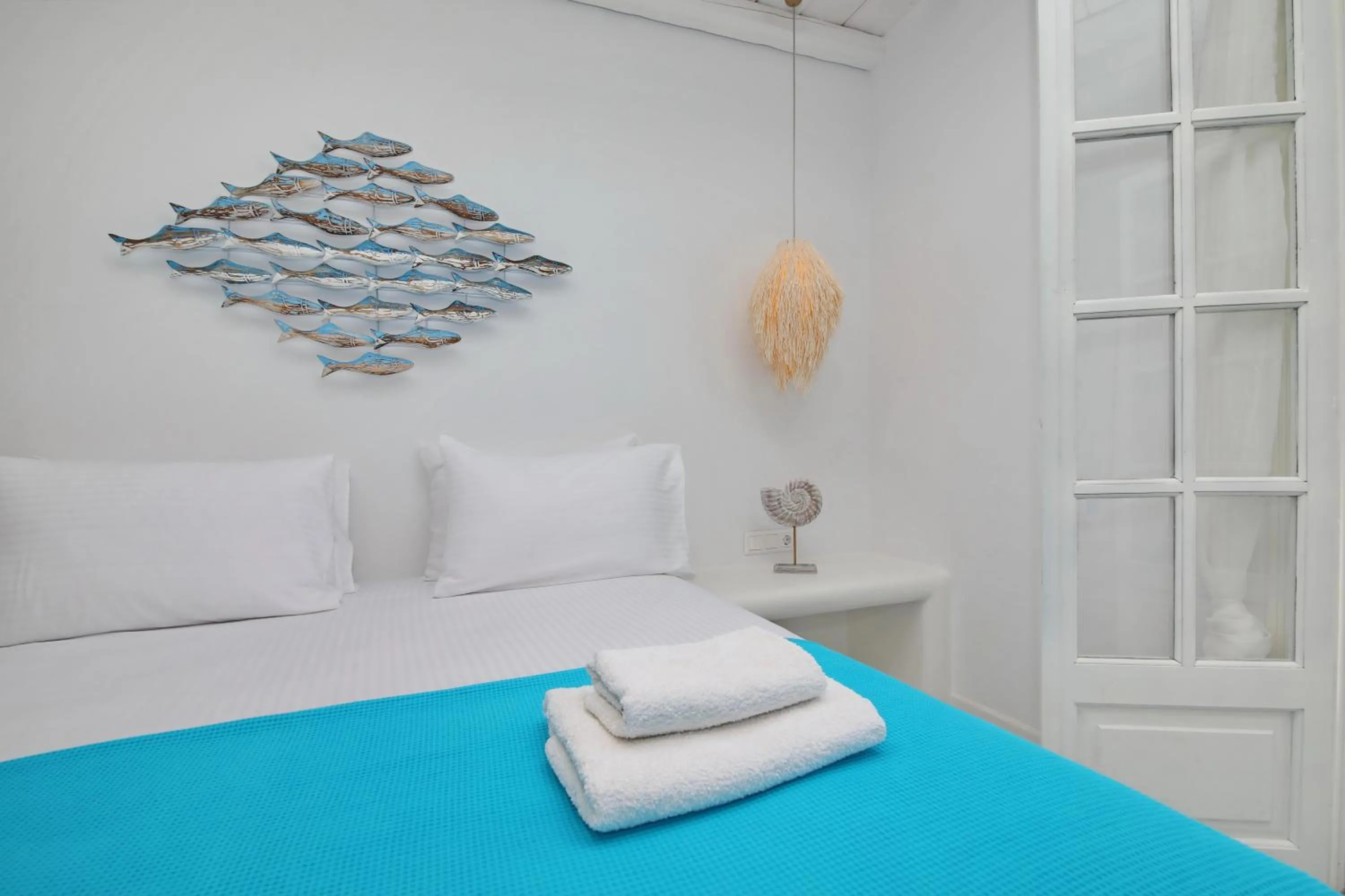 Bed in Evlalia Studios & Villas
