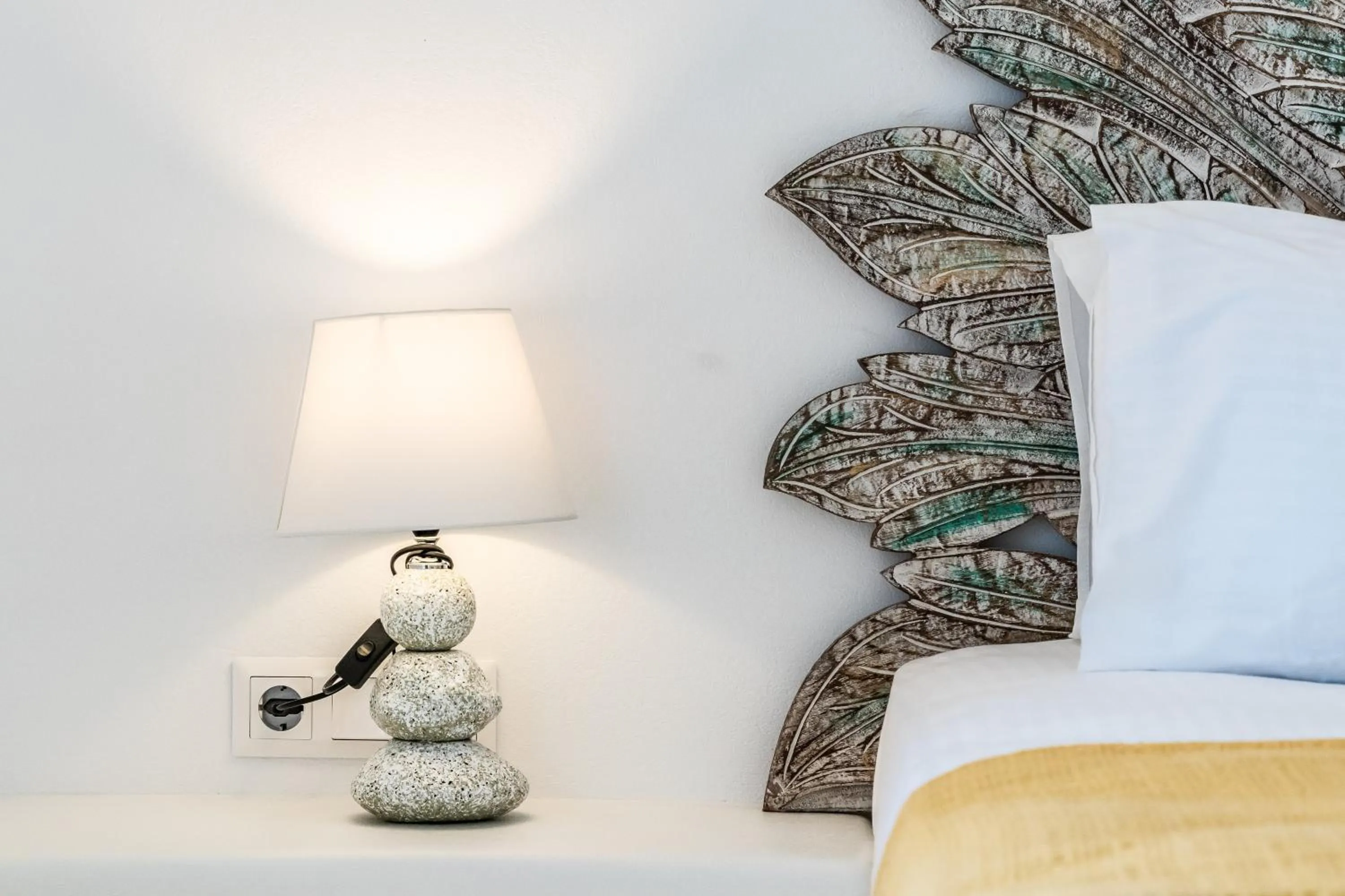 Bed in Evlalia Studios & Villas