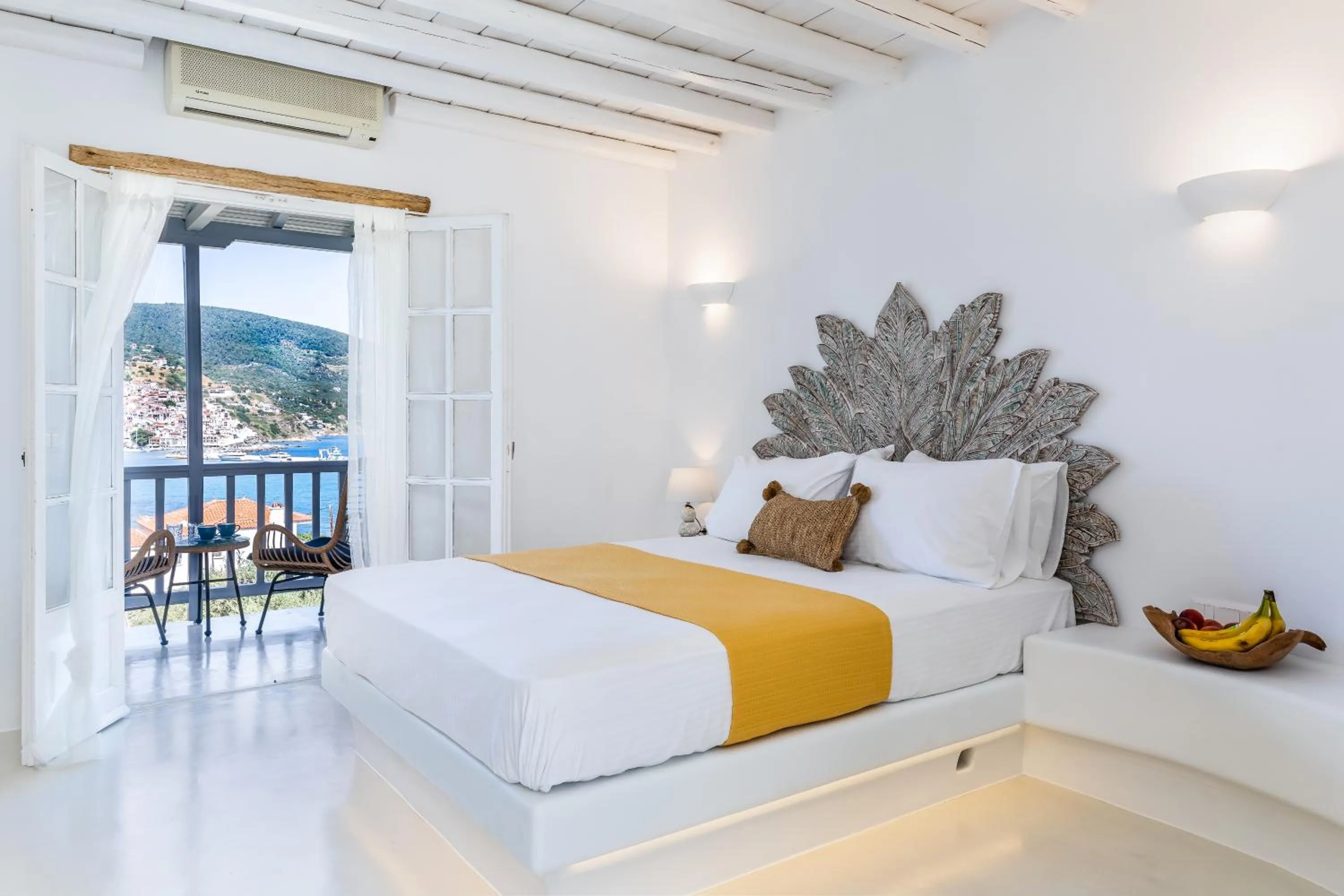 Bed in Evlalia Studios & Villas