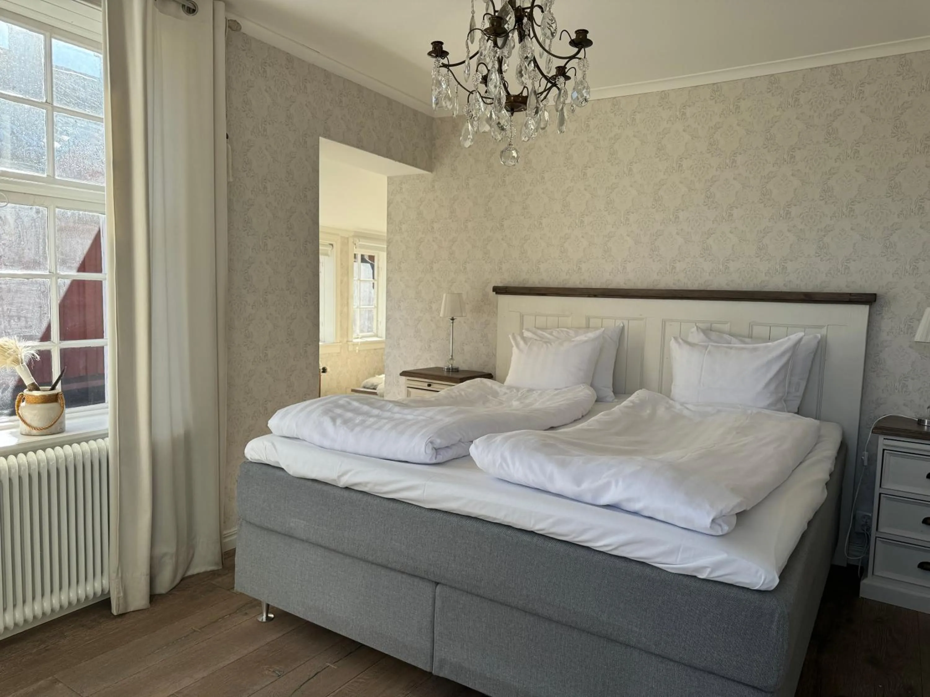 Photo of the whole room, Bed in Hotell Vaxblekaregården