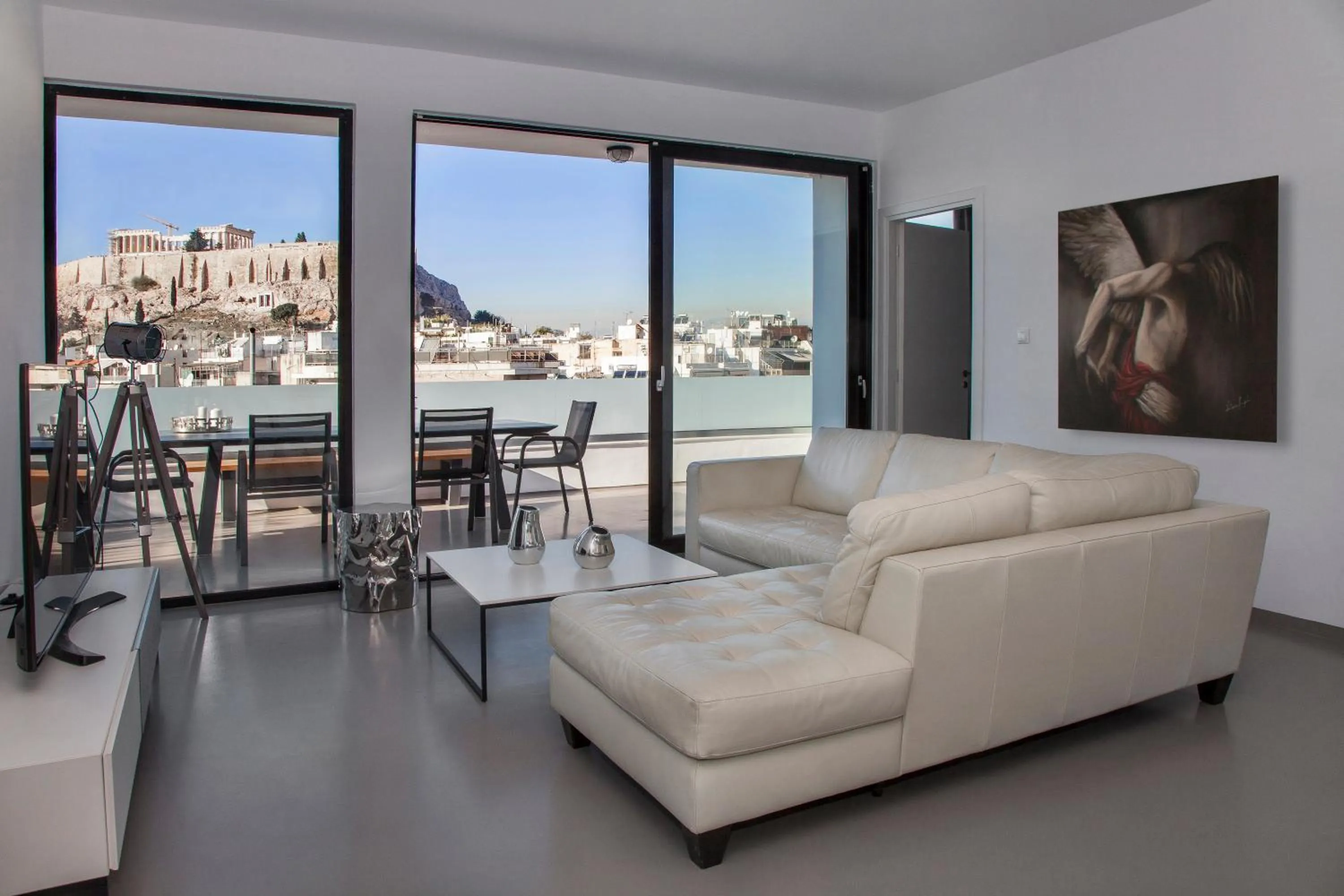 Living room in Luxury Penthouse touching the Acropolis by GHH