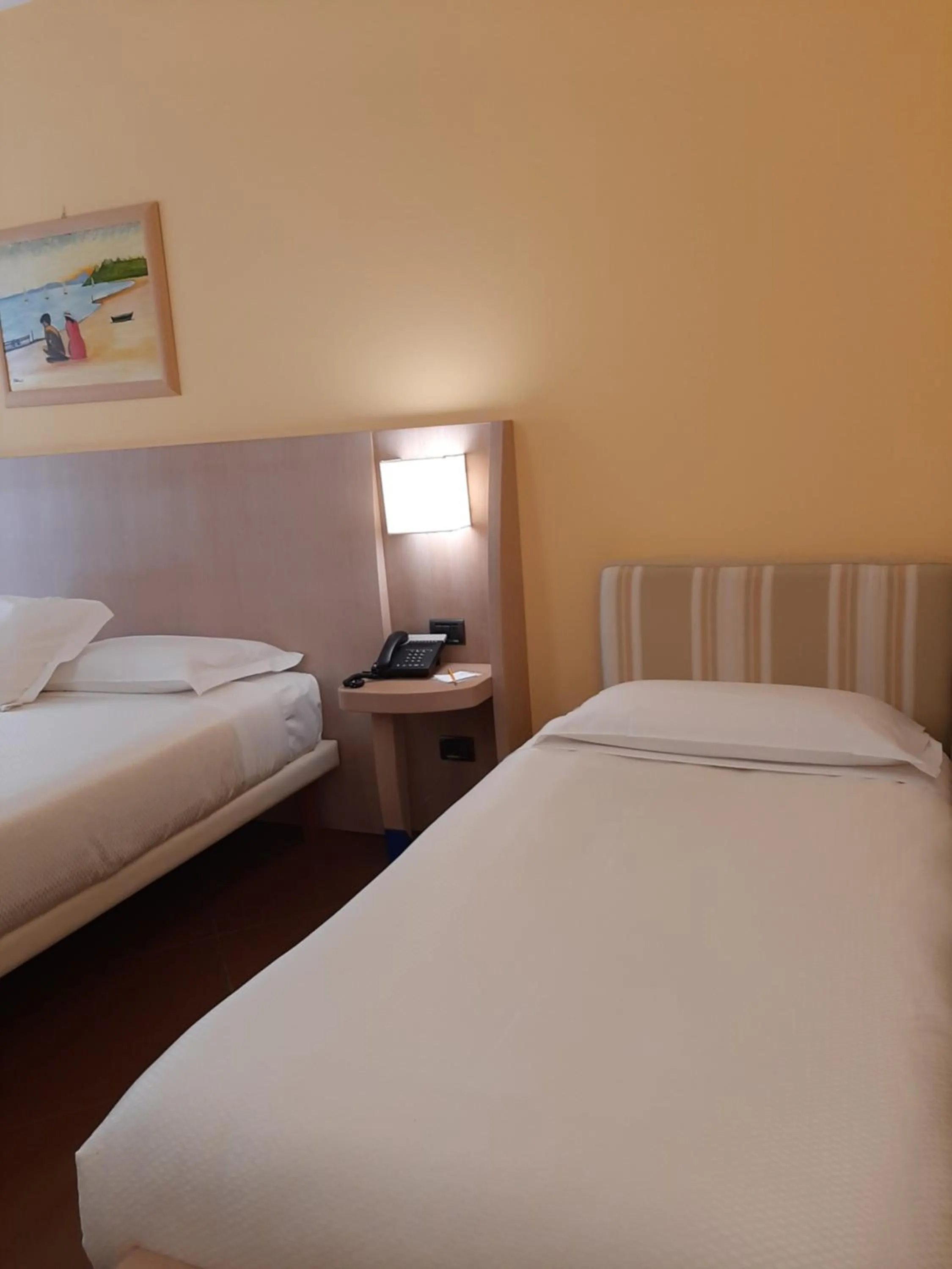 Bed in Hotel Chiaraluna