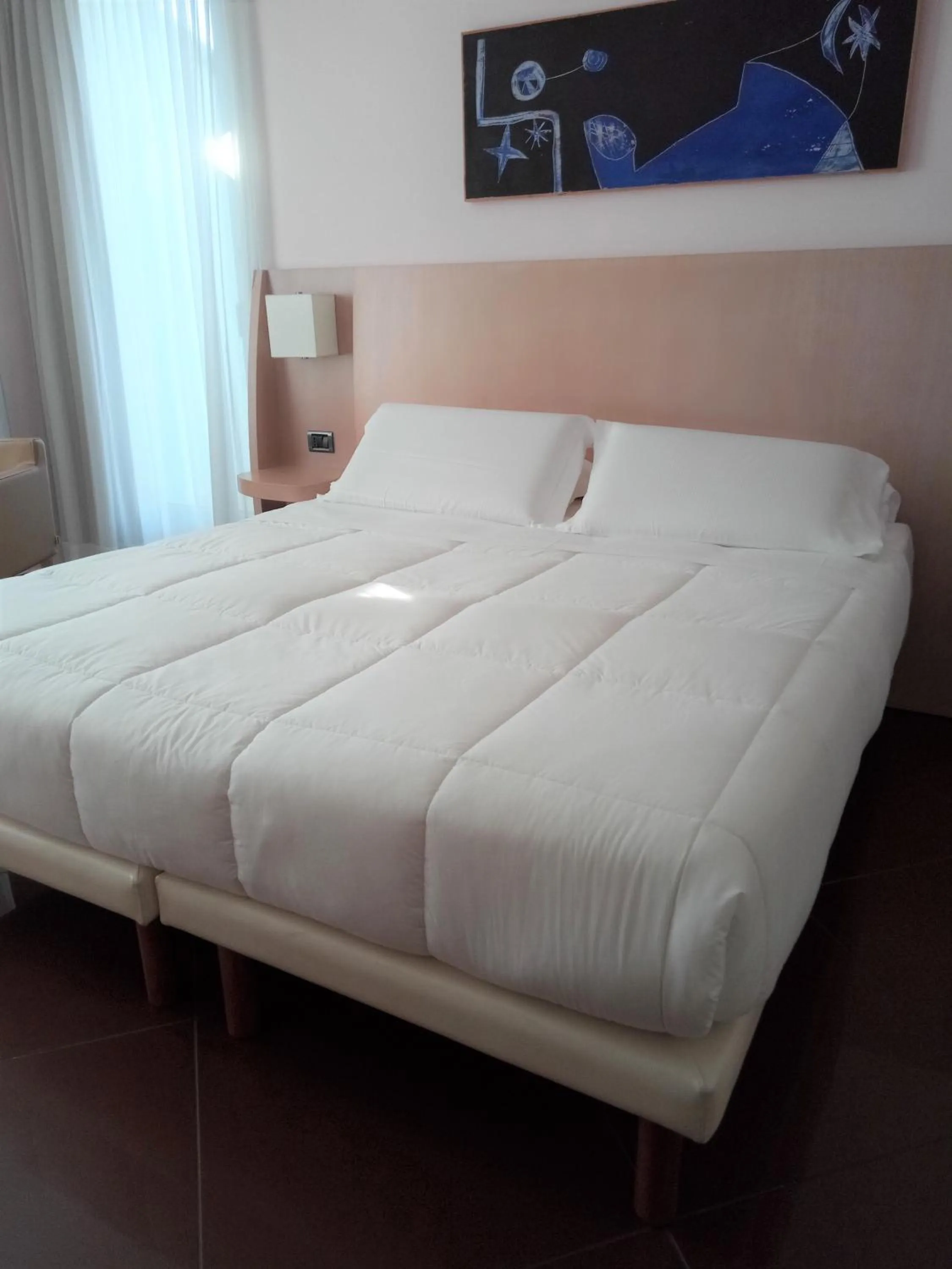 Bed in Hotel Chiaraluna