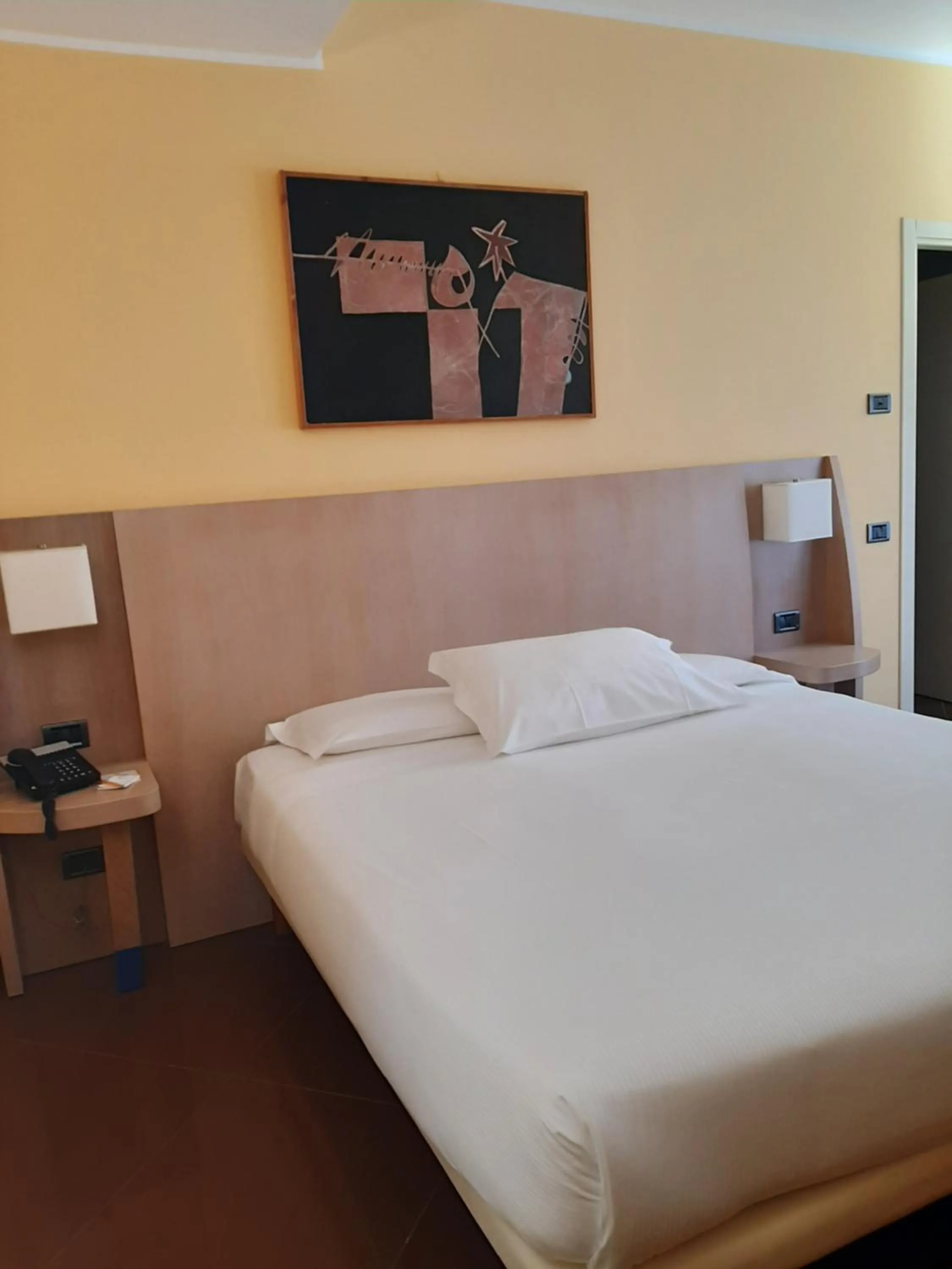 Bed in Hotel Chiaraluna