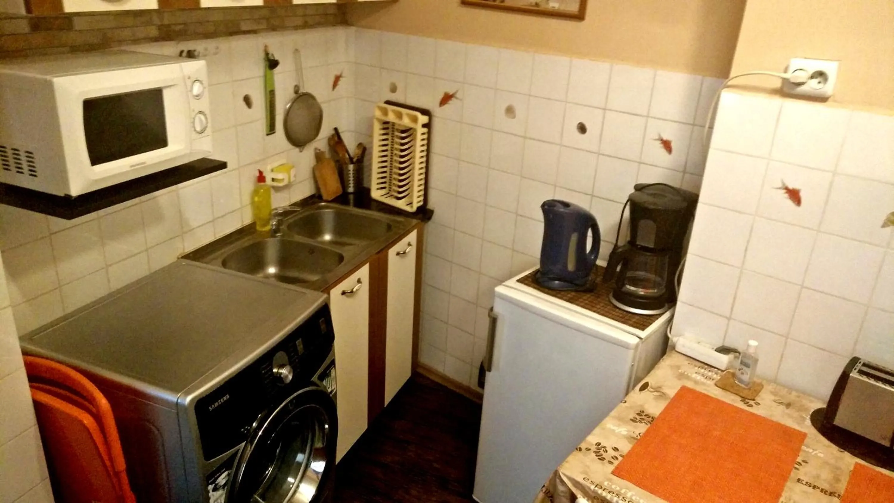 Kitchen or kitchenette in RomPromo Plus Accommodation