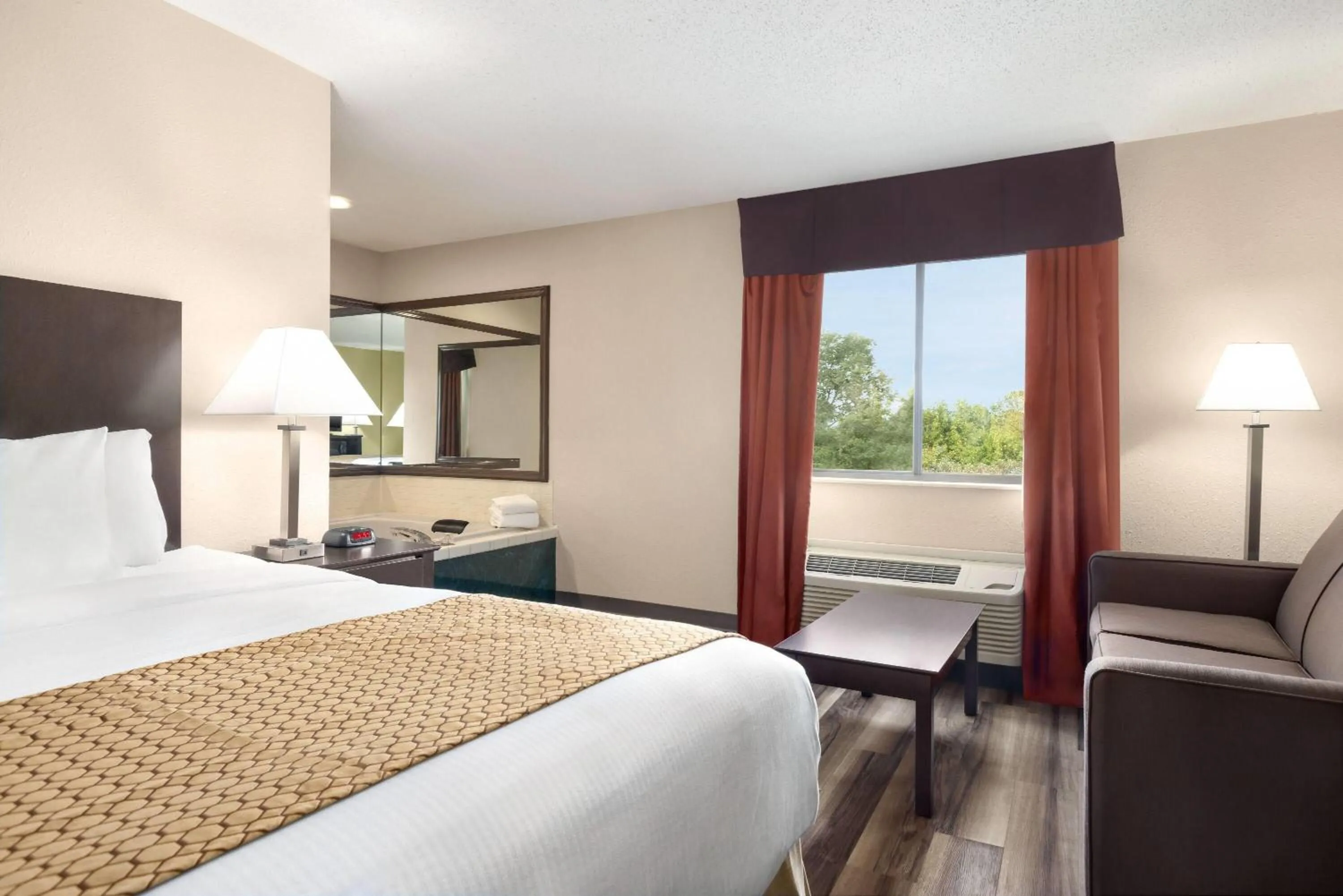 Photo of the whole room, Bed in Baymont by Wyndham Monroe