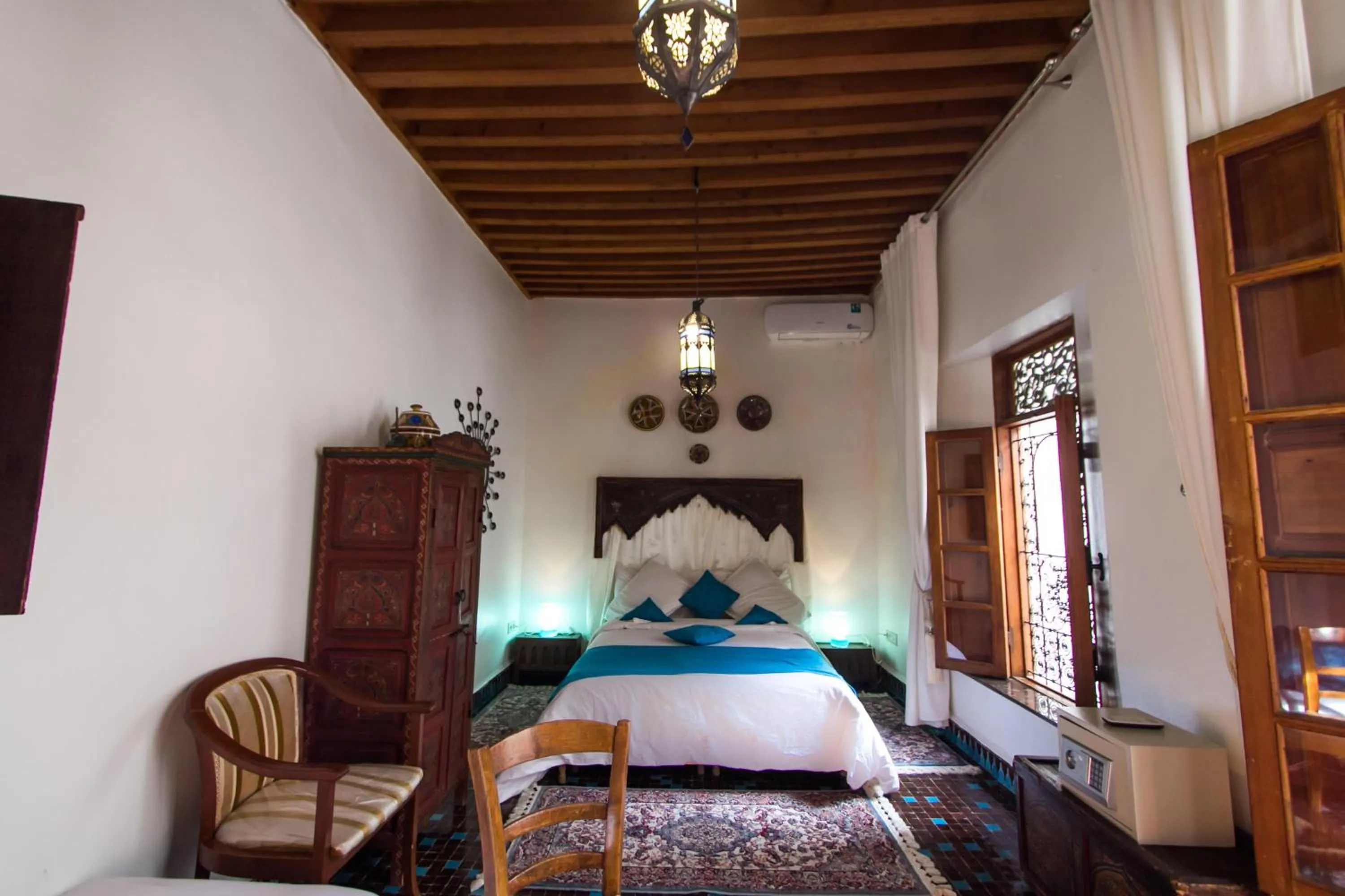 Bed in Riad 53 Fes - Luxury Oasis