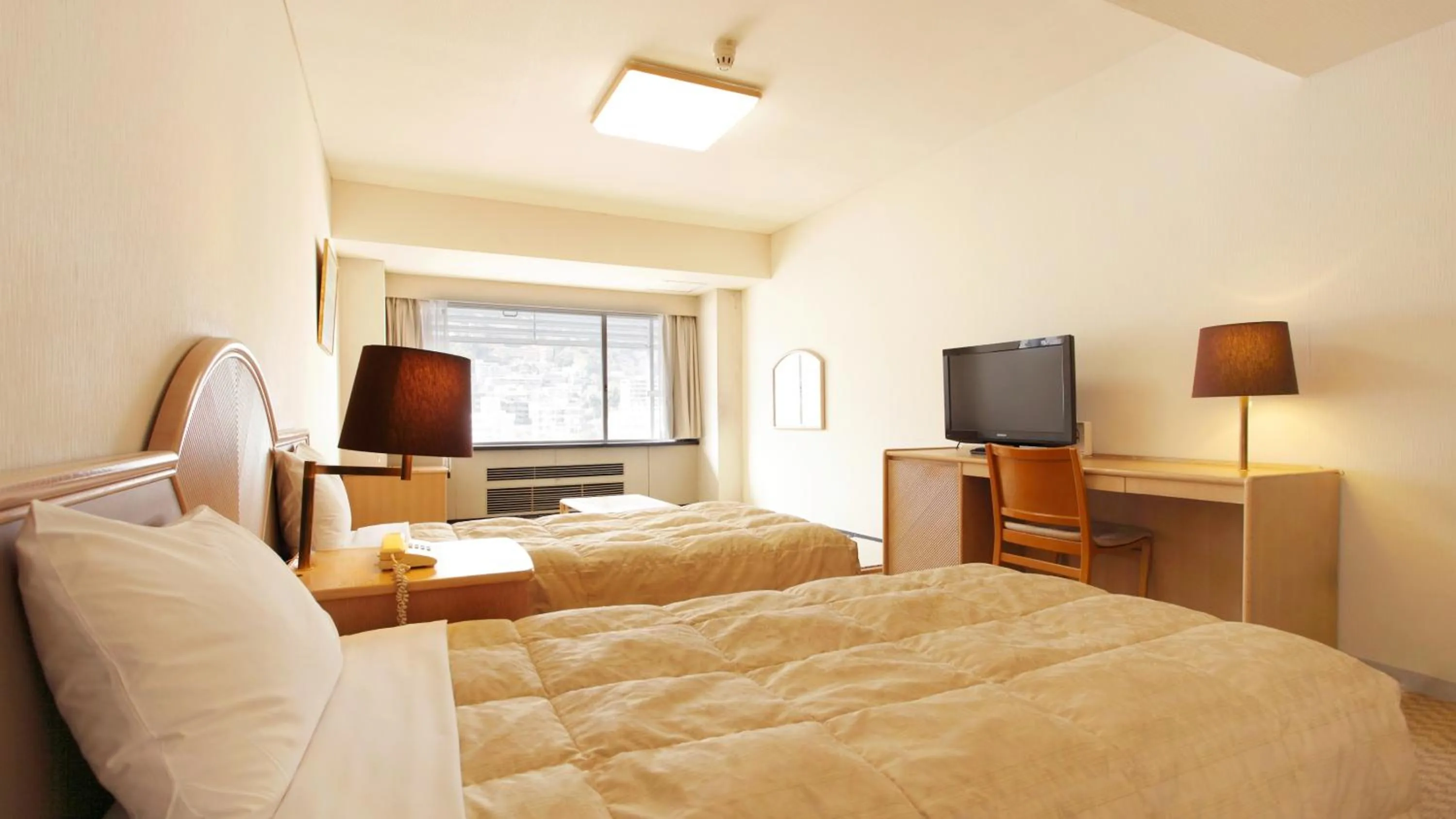 Bed in Atami New Fujiya Hotel