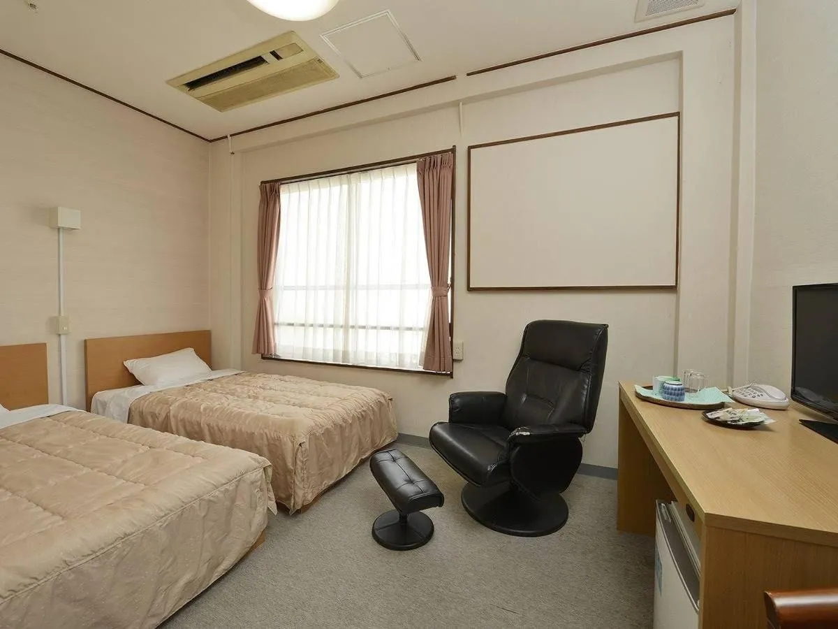 Bed in Itoen Hotel Matsukawakan