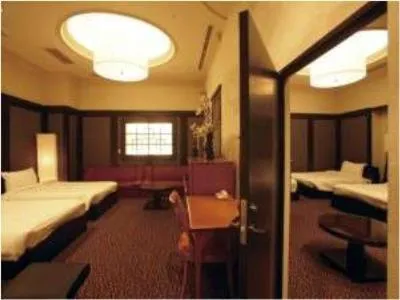 Bed in Atami Season Hotel