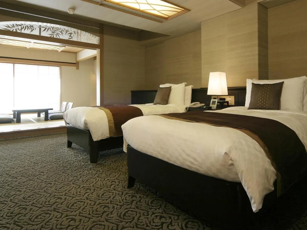 Bed in Atami Season Hotel