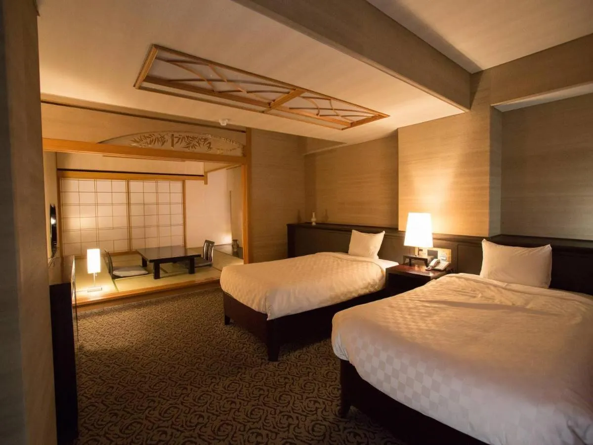 Bed in Atami Season Hotel