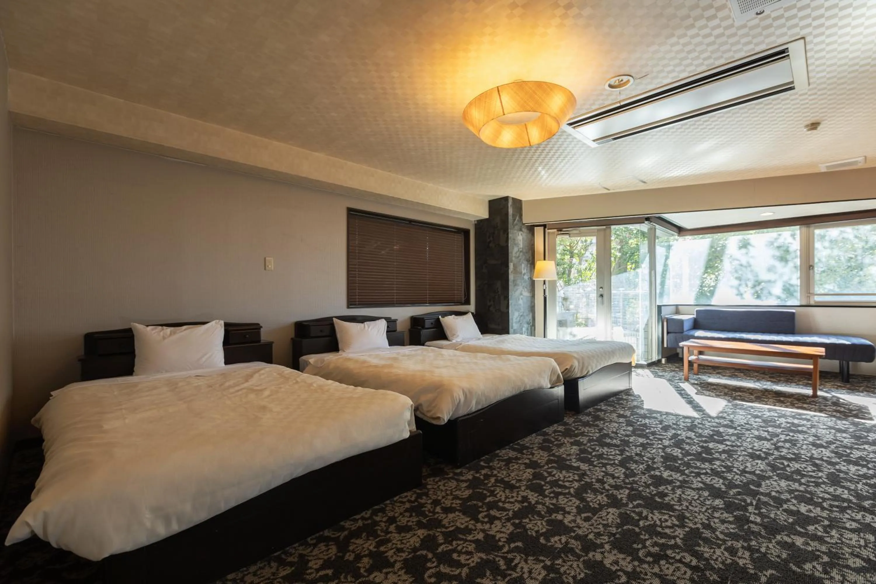 Bed in Atami Season Hotel