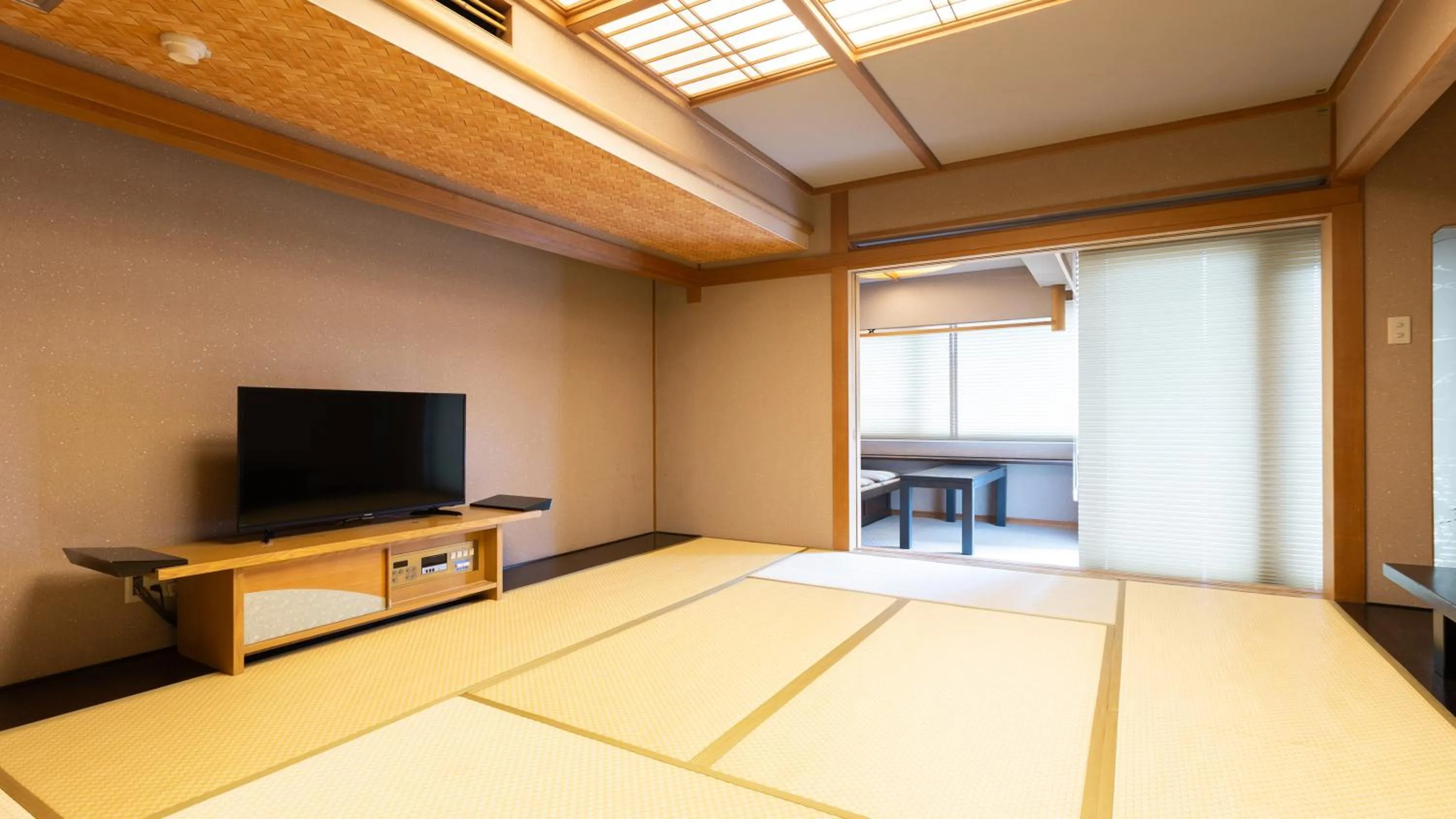 Bed in Atami Season Hotel