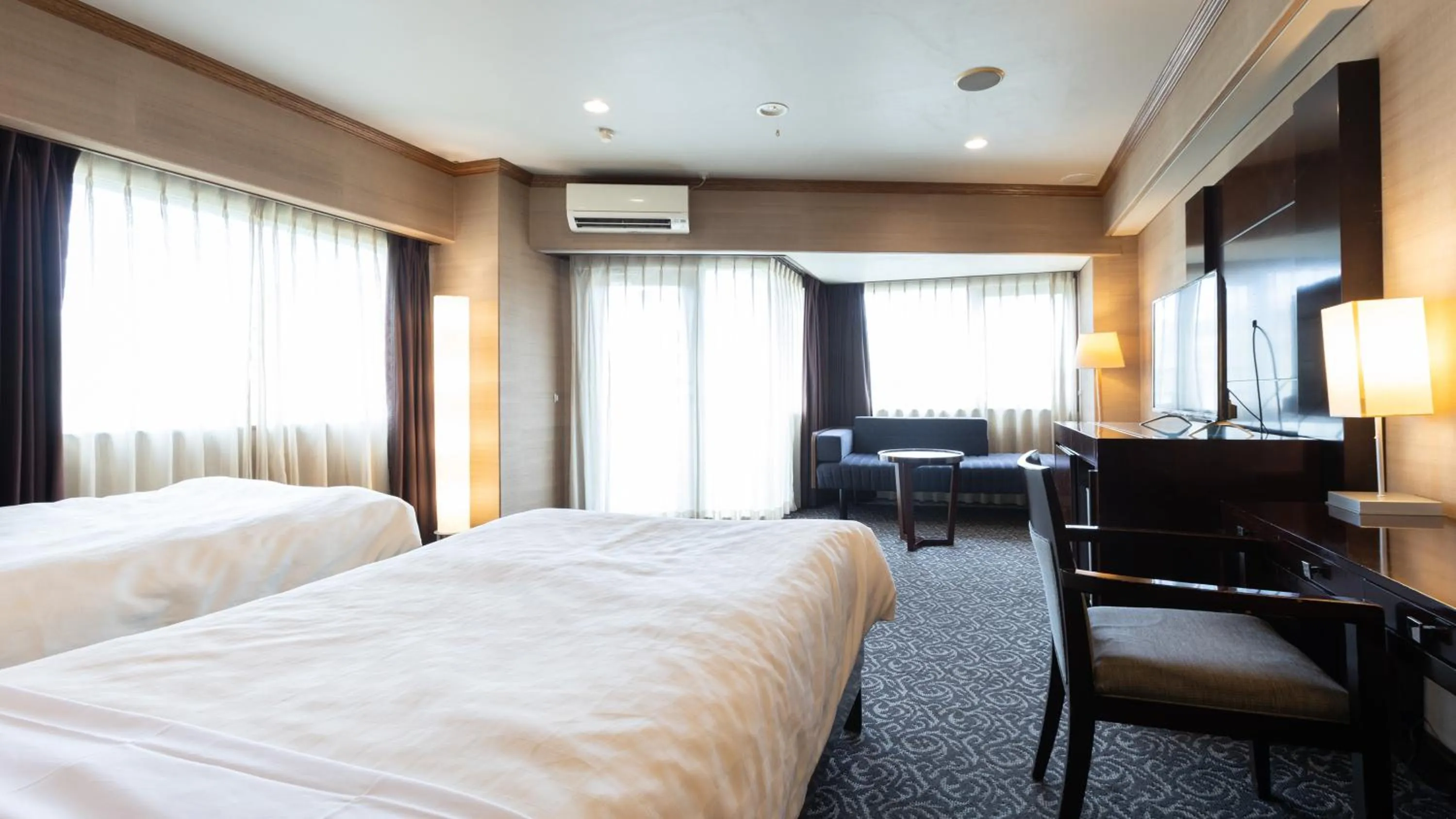 Bed in Atami Season Hotel