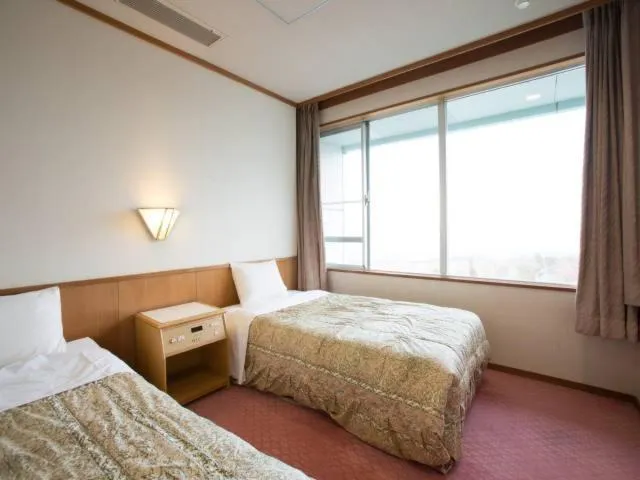 Bed in Ikaho Grand Hotel