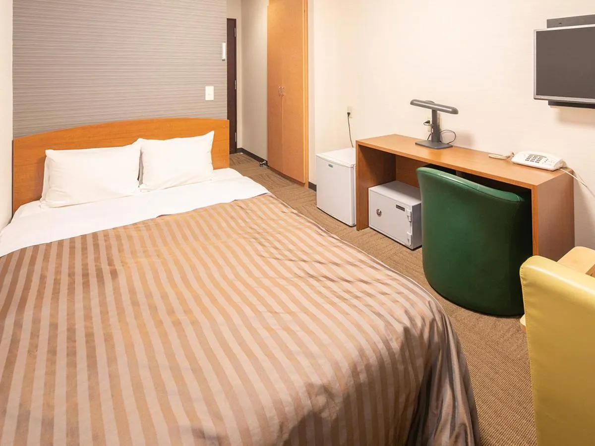 Bed in Ikaho Grand Hotel