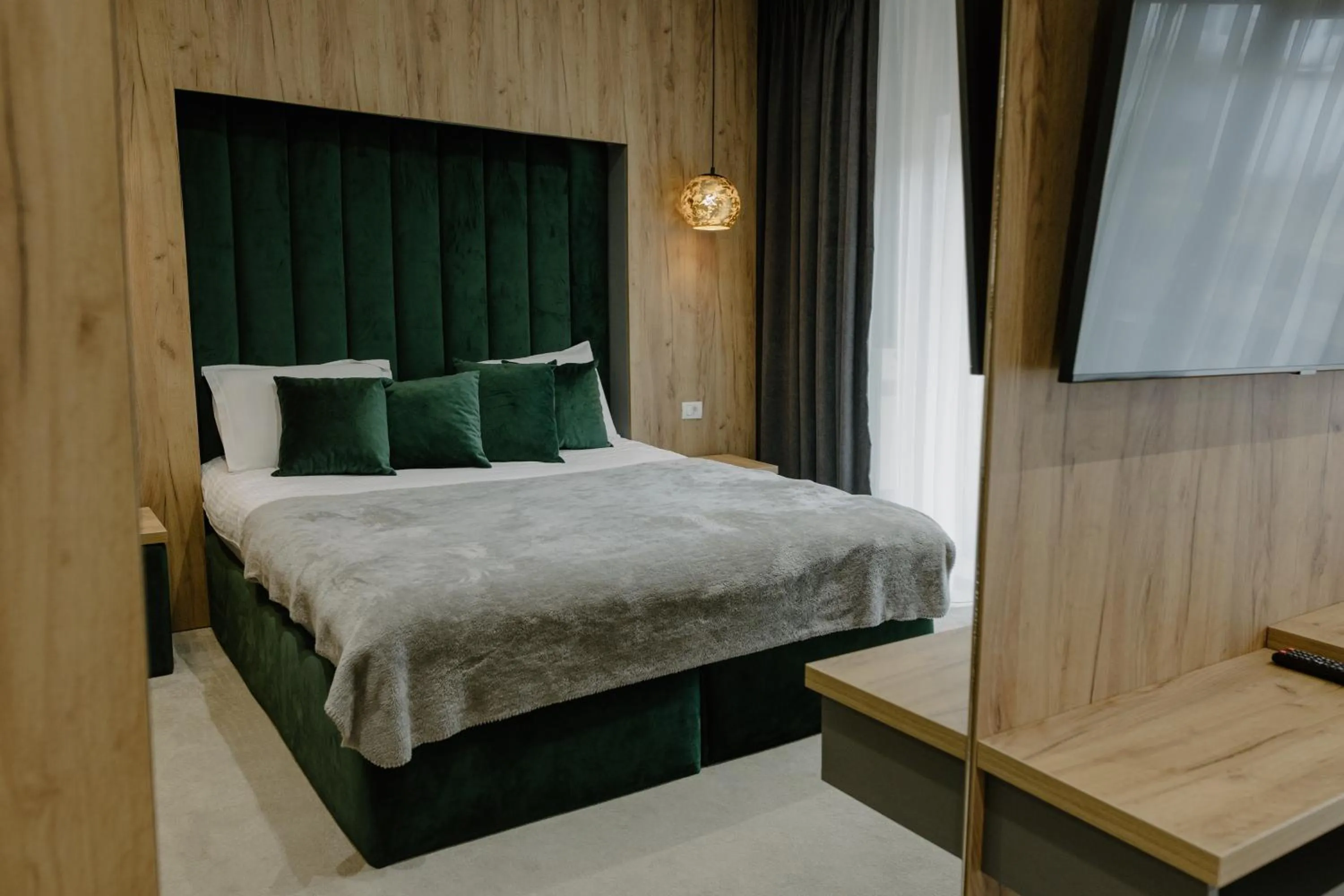 Bed in Hotel Muntele Mic