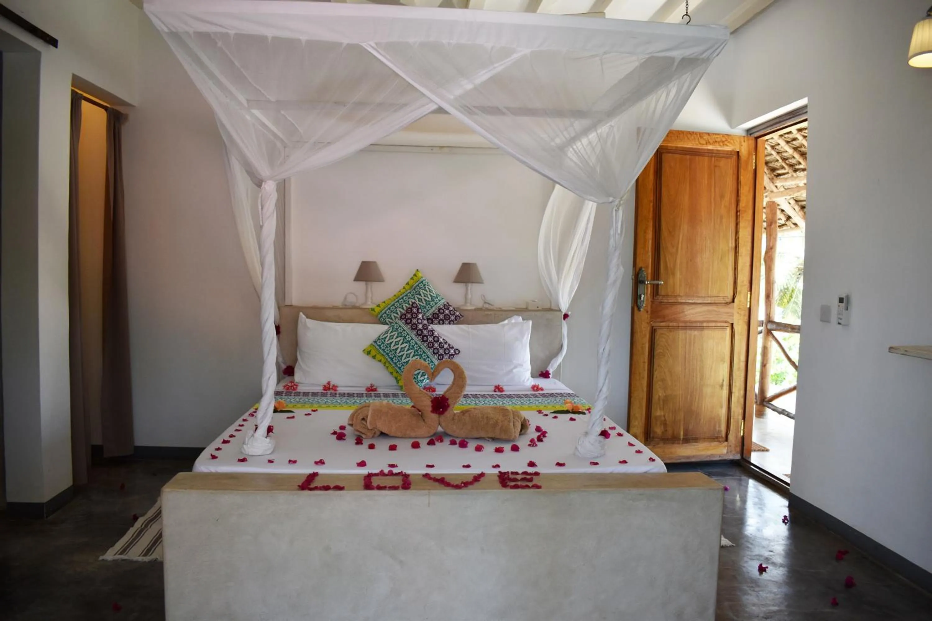Photo of the whole room, Bed in Villa Huruma