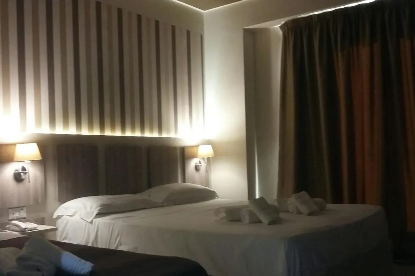 Bed in Hotel Cliché