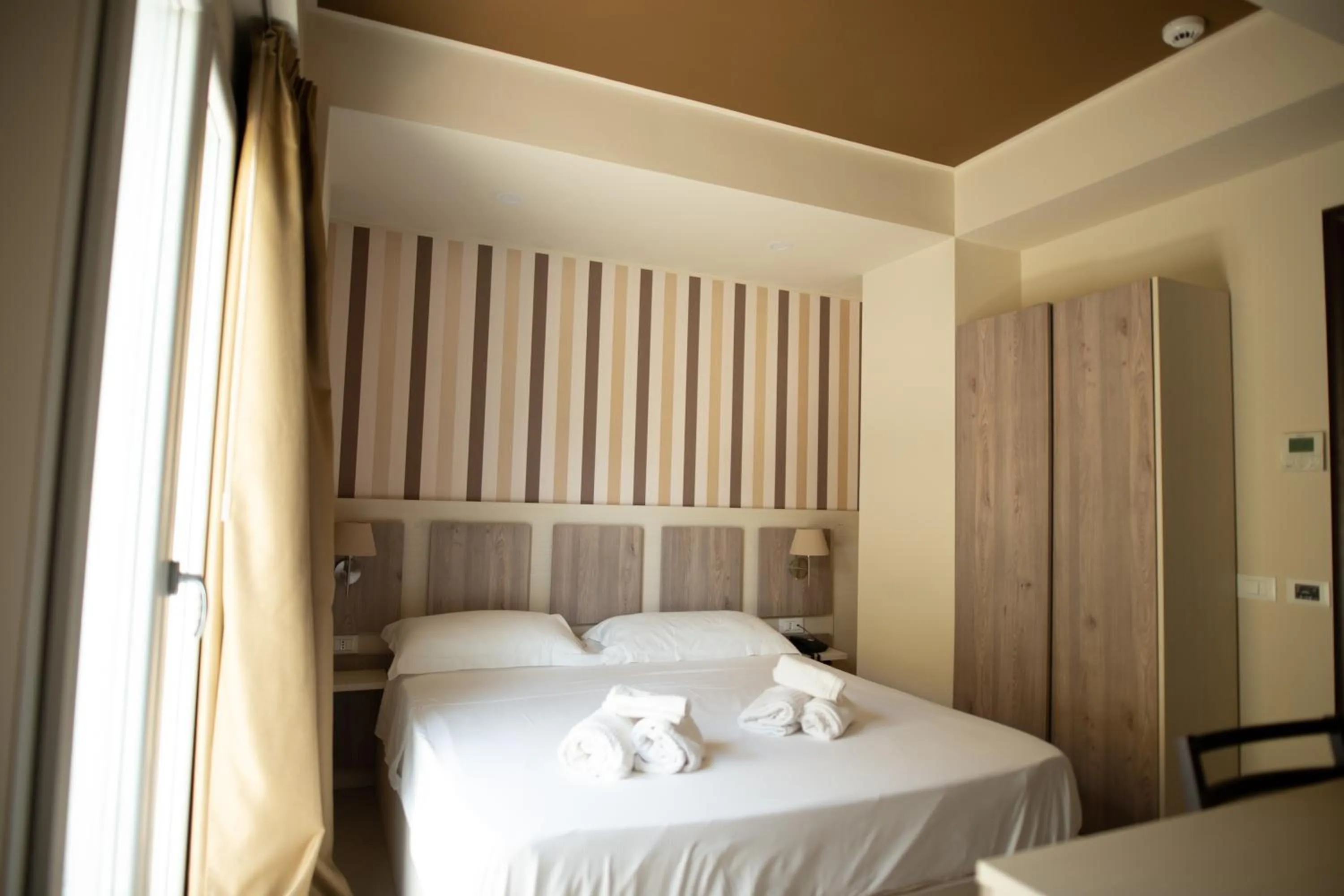 Bed in Hotel Cliché