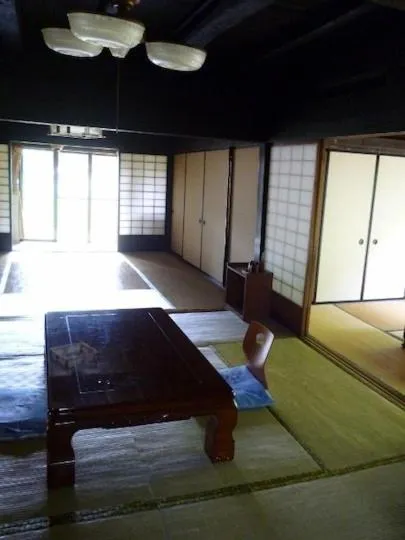 Living room, Bed in Minshuku Yurika