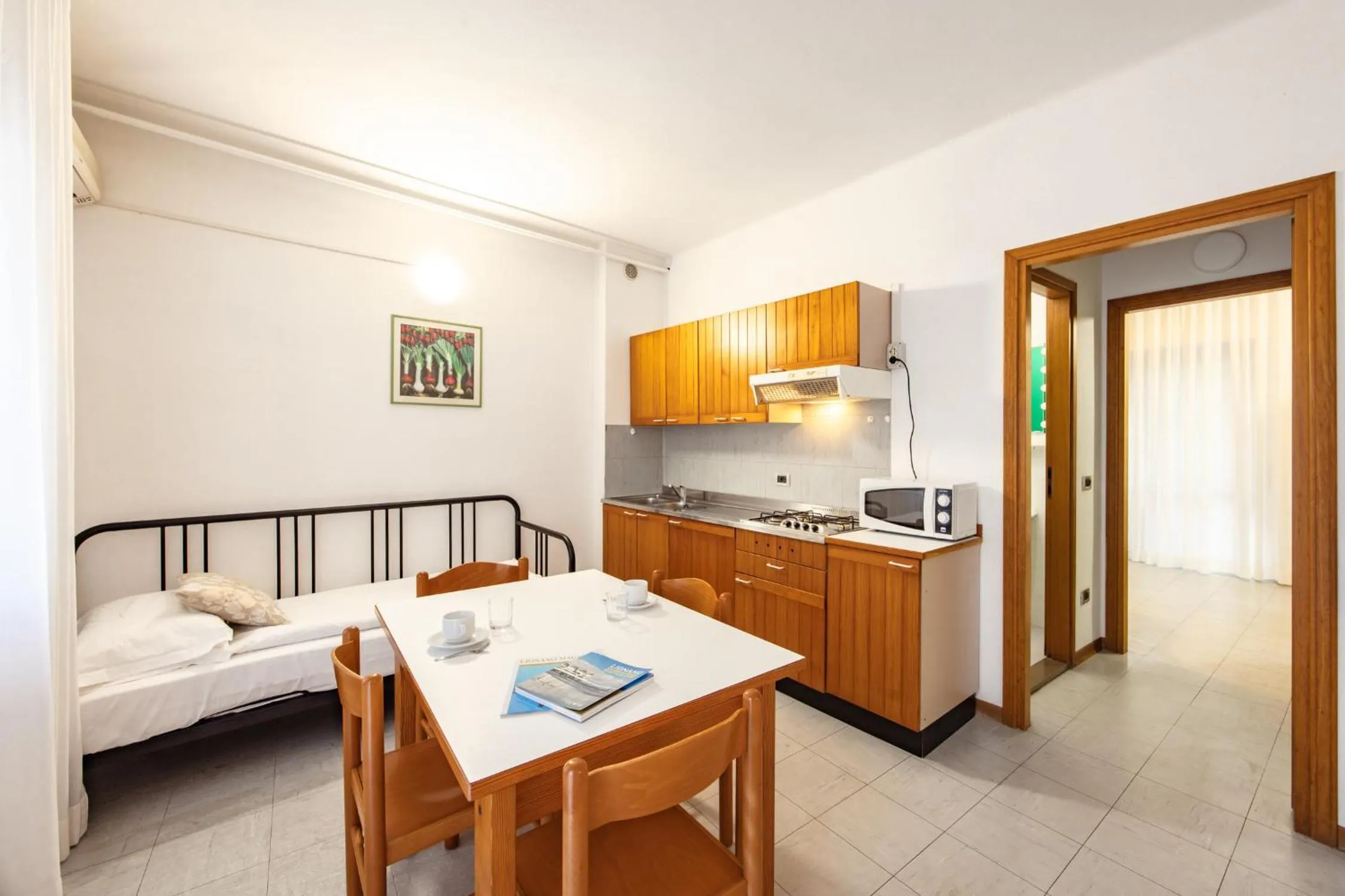 Kitchen or kitchenette, Bed in Aparthotel Carinzia