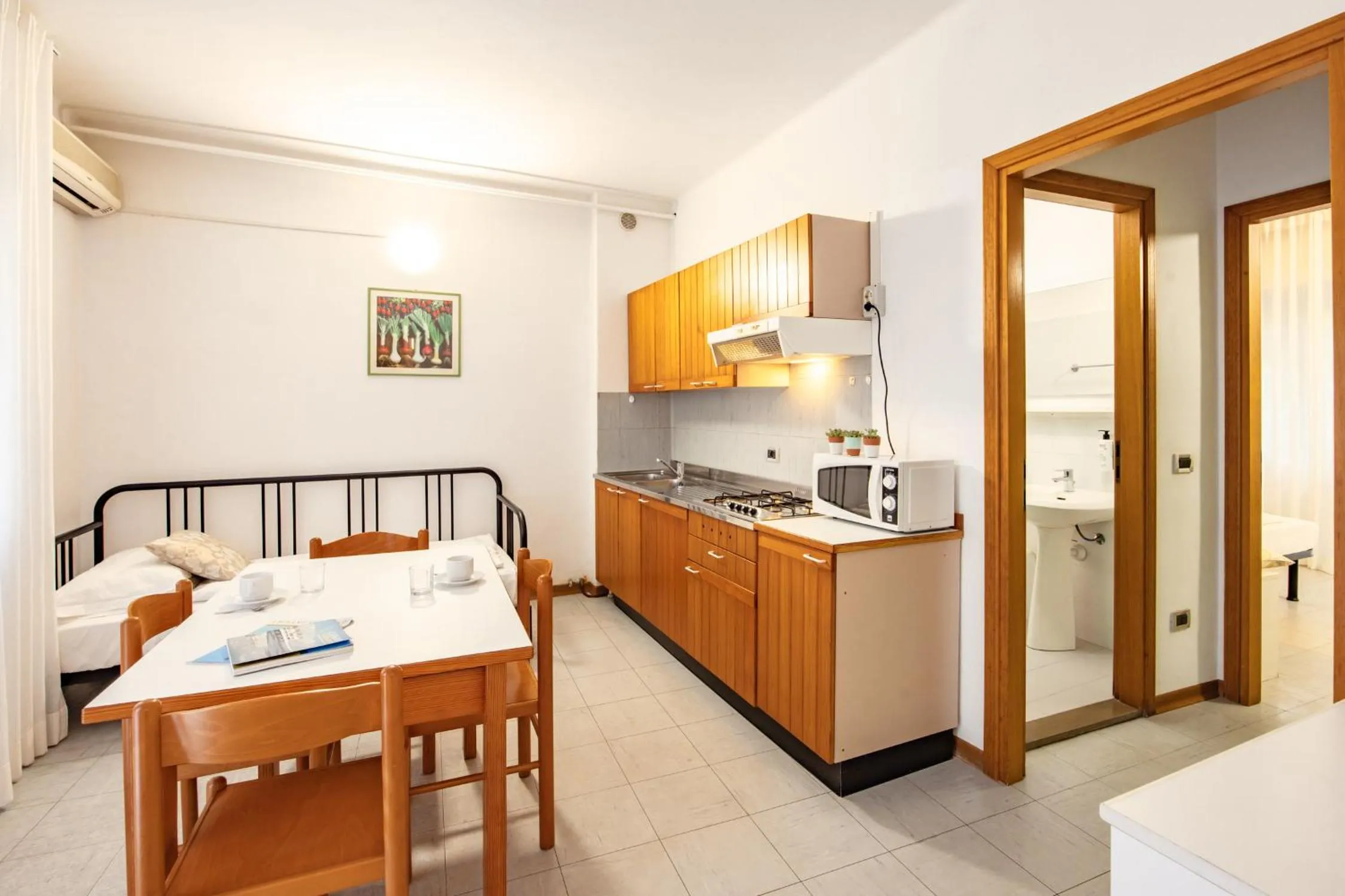 Kitchen or kitchenette, Bed in Aparthotel Carinzia