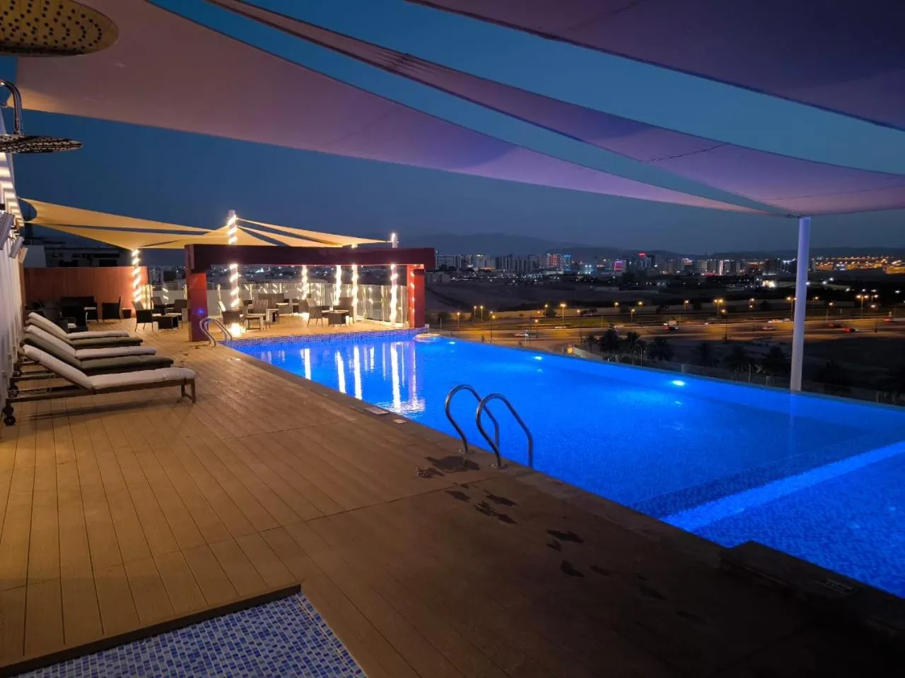Swimming pool in Carnelian Muscat - Airport Hotel