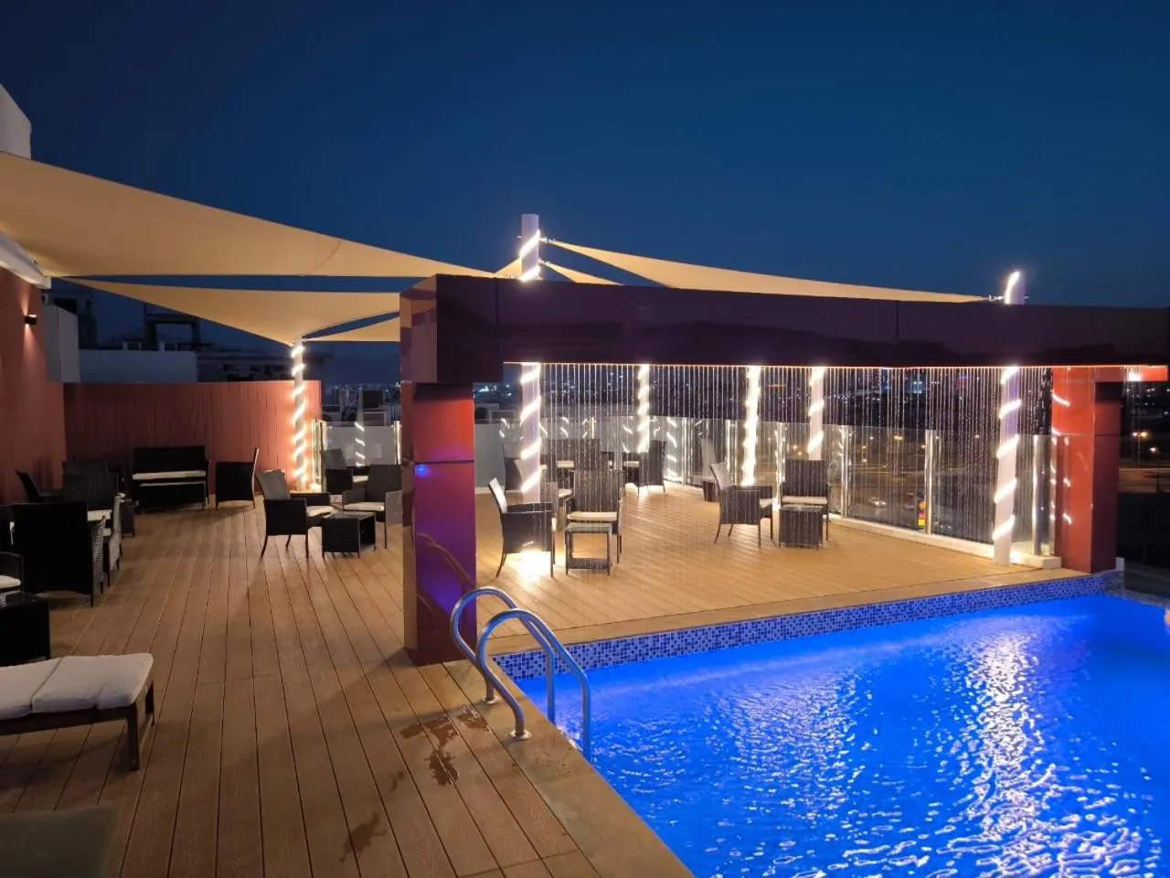 Swimming pool in Carnelian Muscat - Airport Hotel