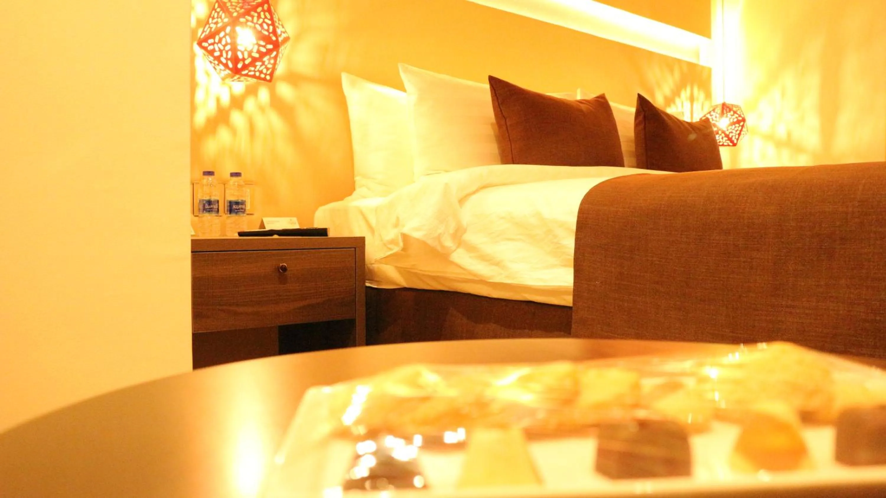 Bedroom, Bed in Carnelian Muscat - Airport Hotel